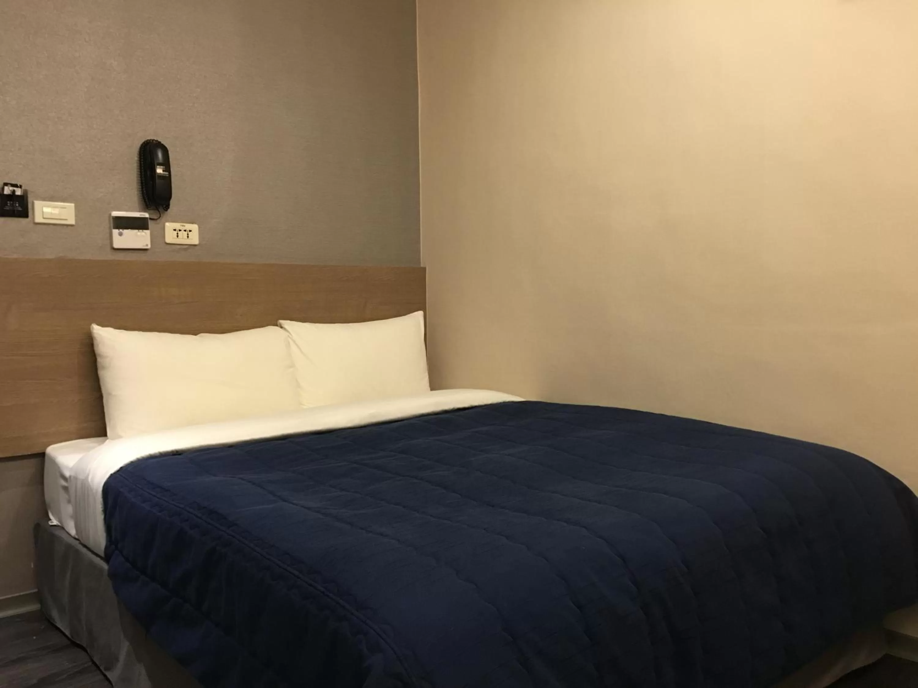 Bed in Bulowan Hotel