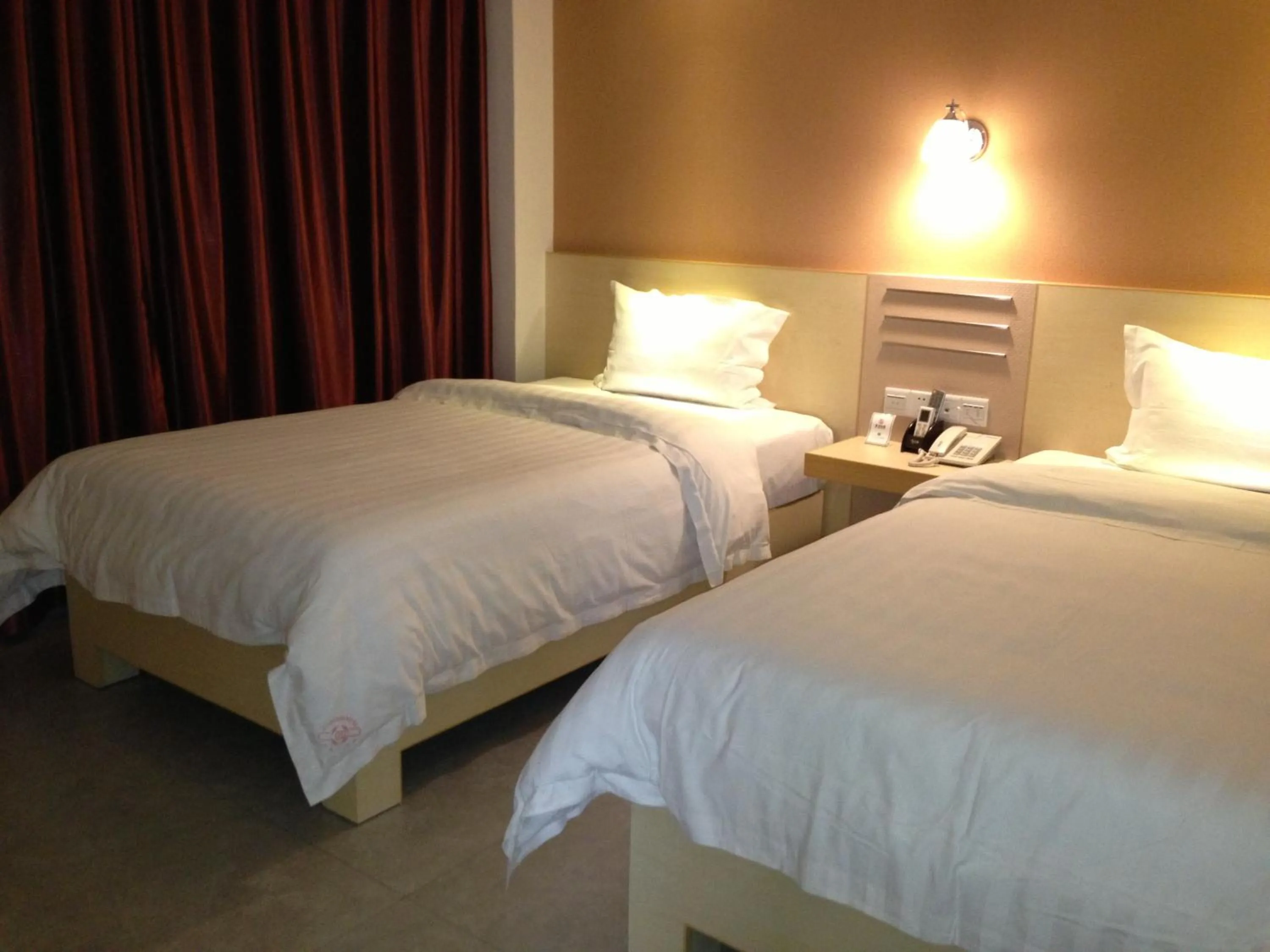 Bed in Guang Dong Hotel