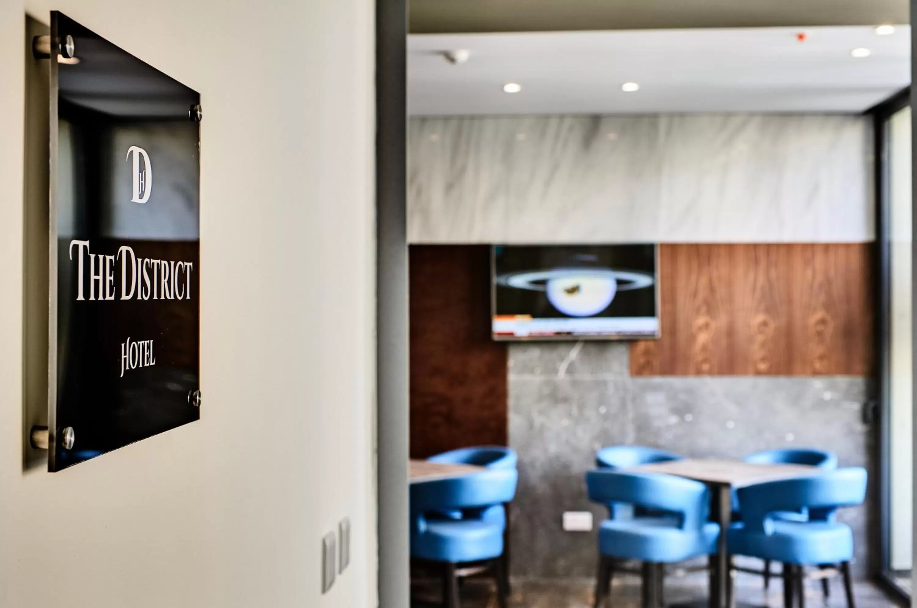 Property logo or sign in The District Hotel