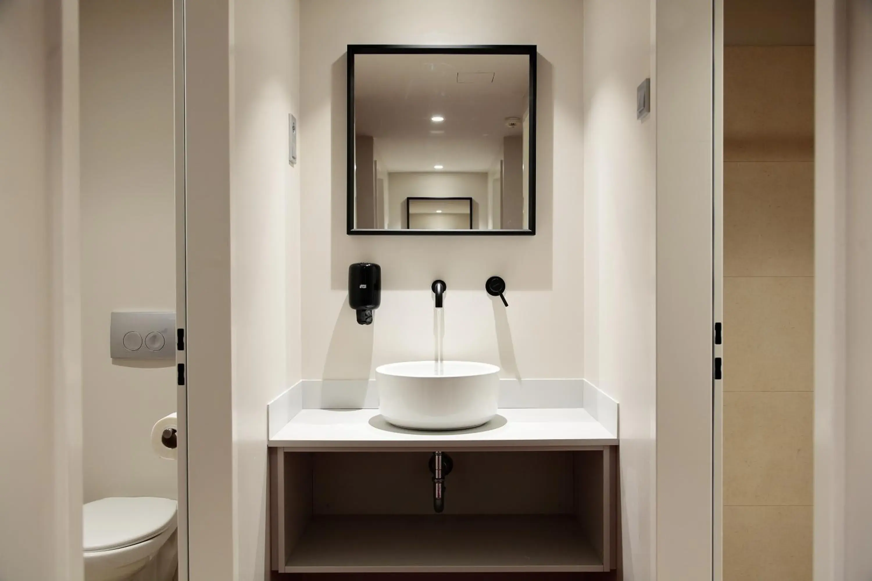 Toilet, Bathroom in Maverick Urban Lodge