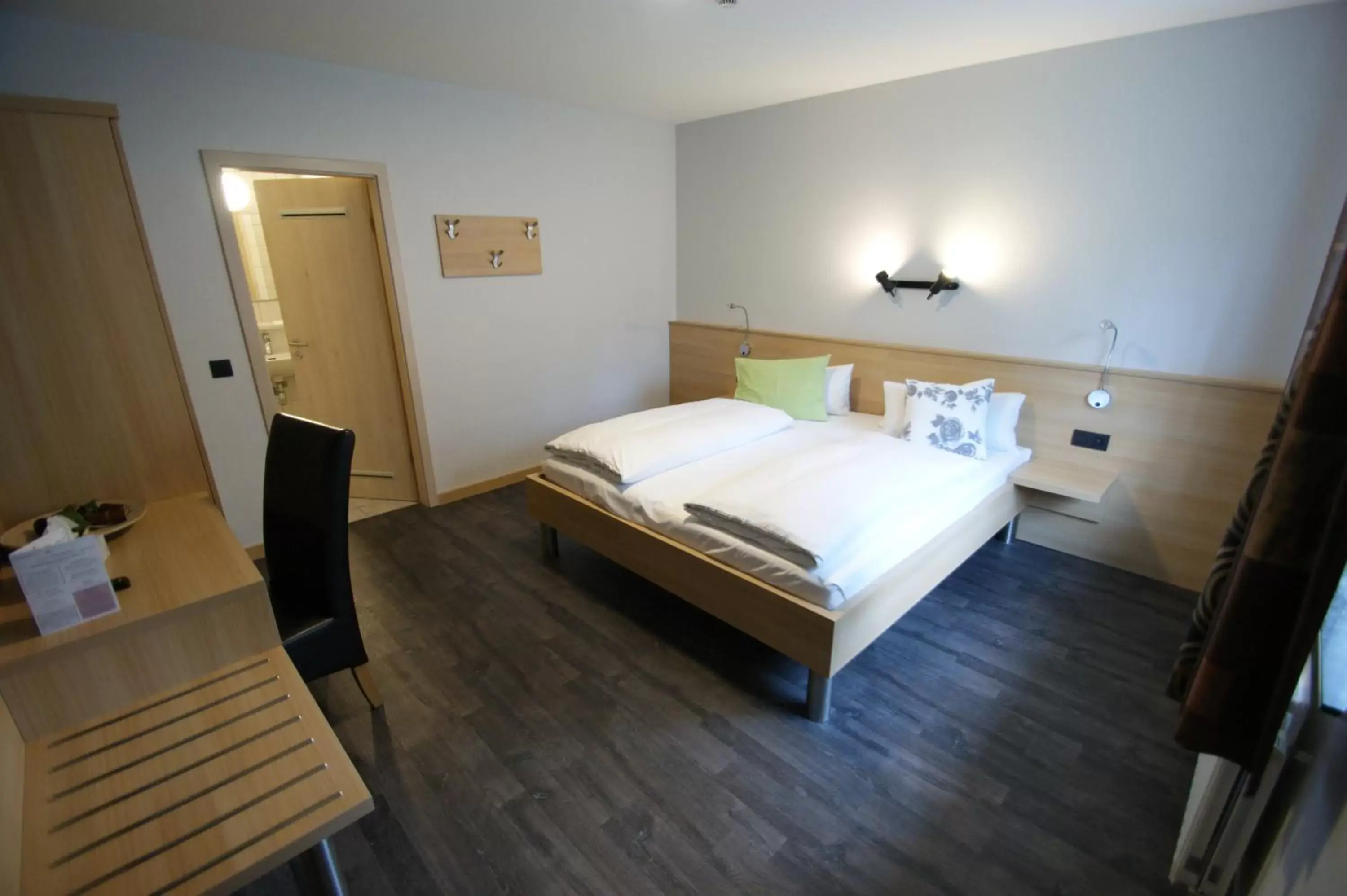 Family Room (5 People) 1 double/3 single beds in Hotel Restaurant Tychon AG Family Room (5 People) 1 double/3 single beds in Hotel Restaurant Tychon AG