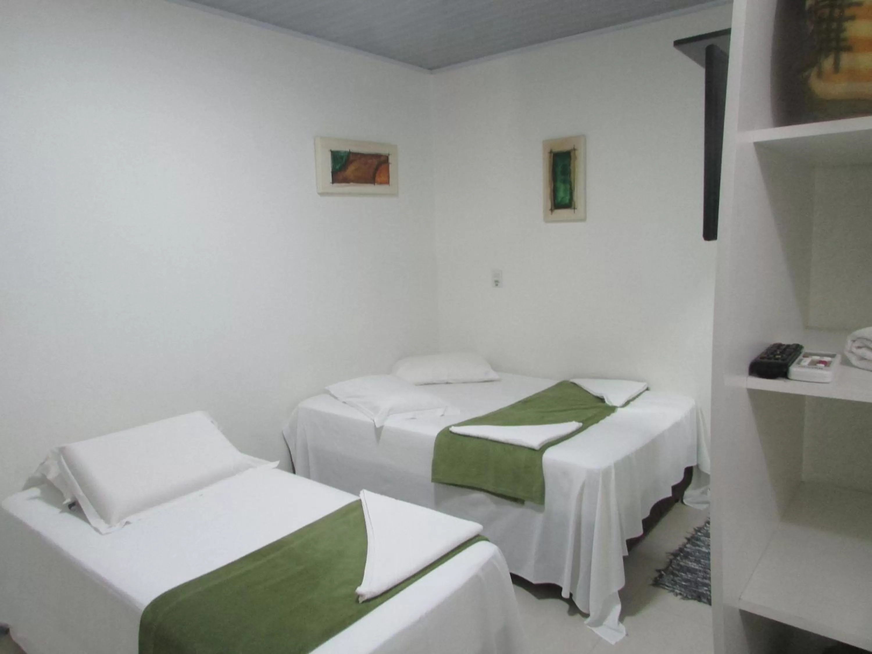 Photo of the whole room, Bed in Pousada Casa do Luiggi