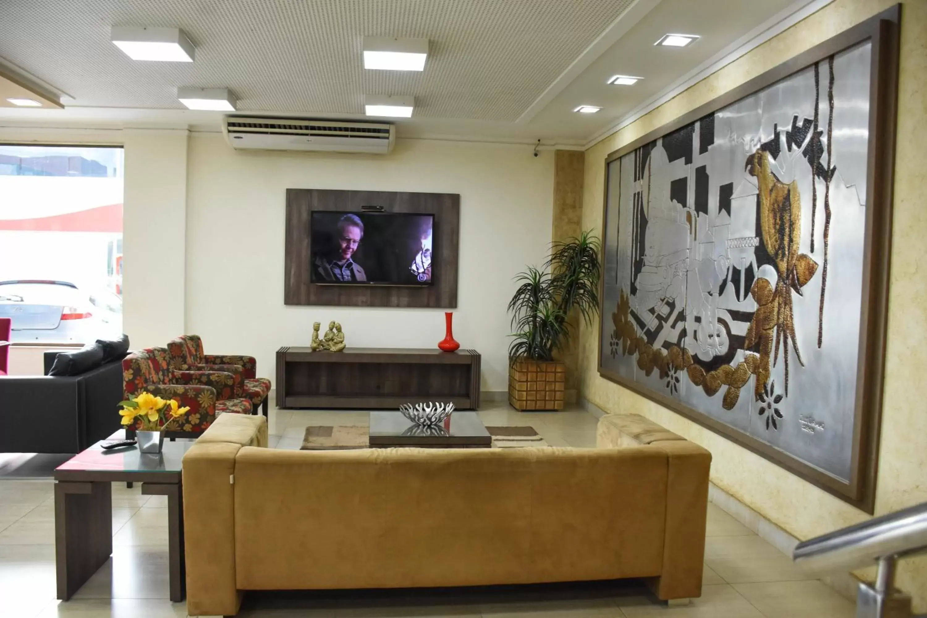 Living room in Larison Executive - by Easy Hotéis Living room in Larison Executive - by Easy Hotéis