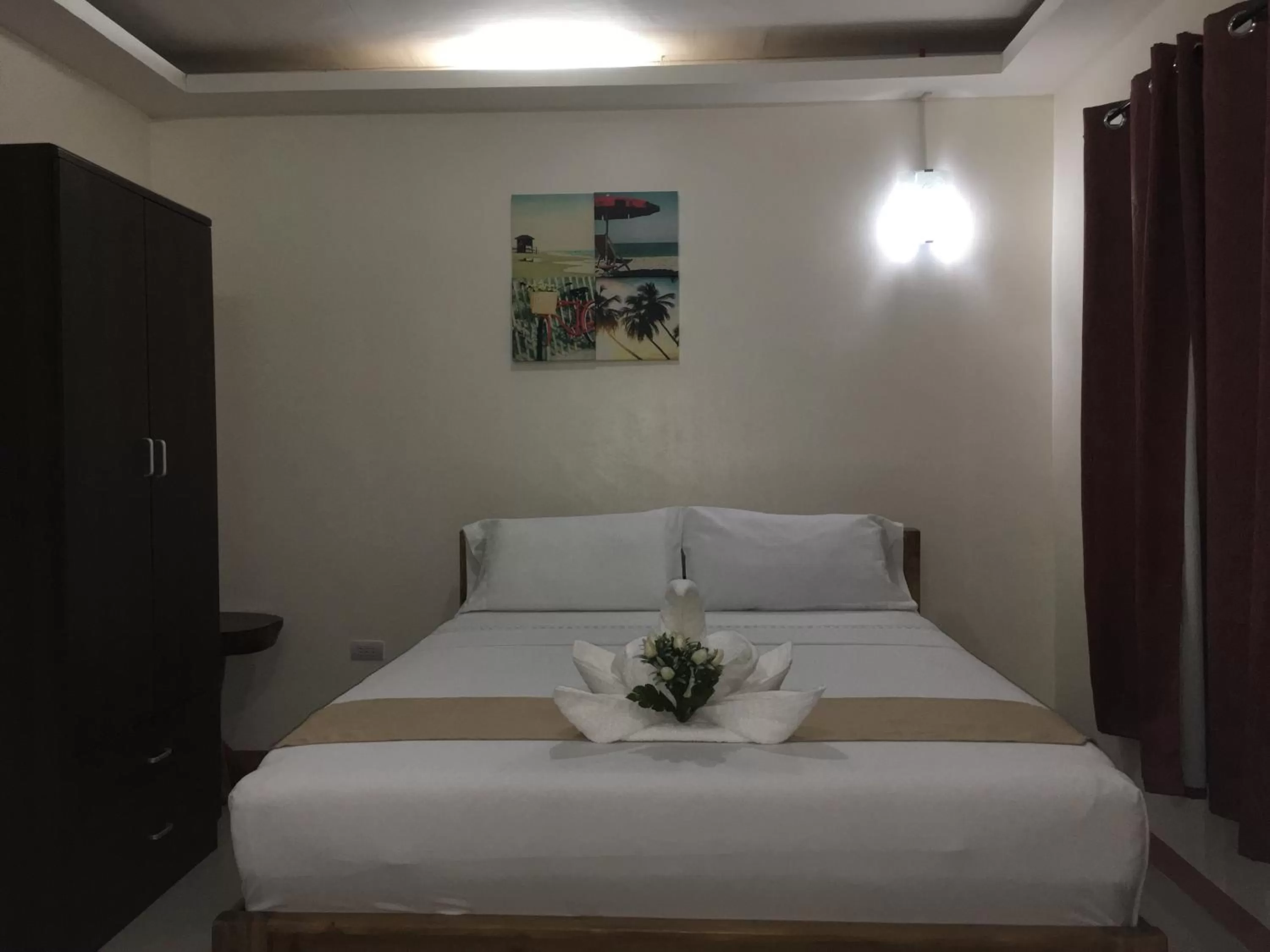 Bed in Aloha Seaside Resort