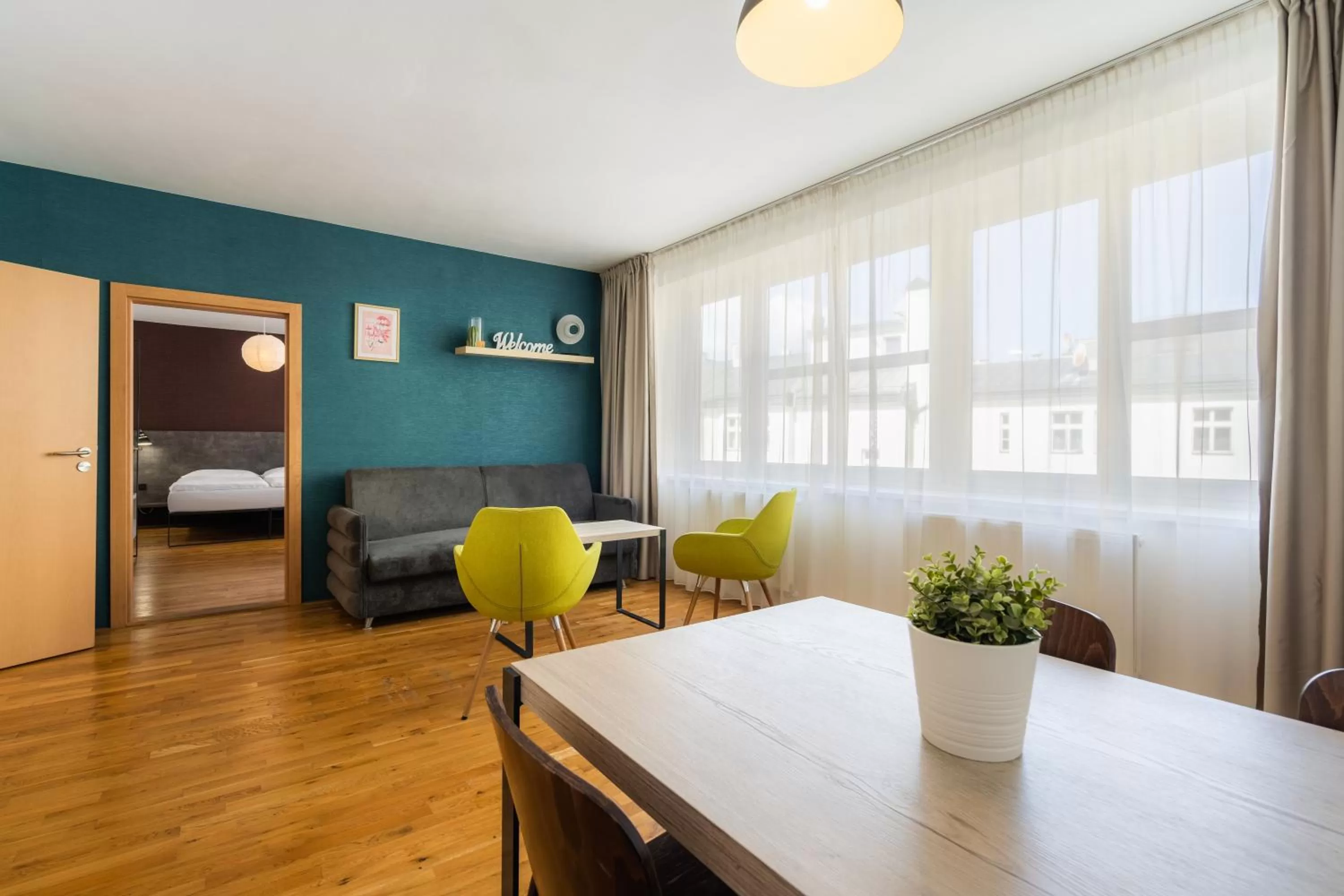 Seating area, Bed in EA ApartHotel Melantrich