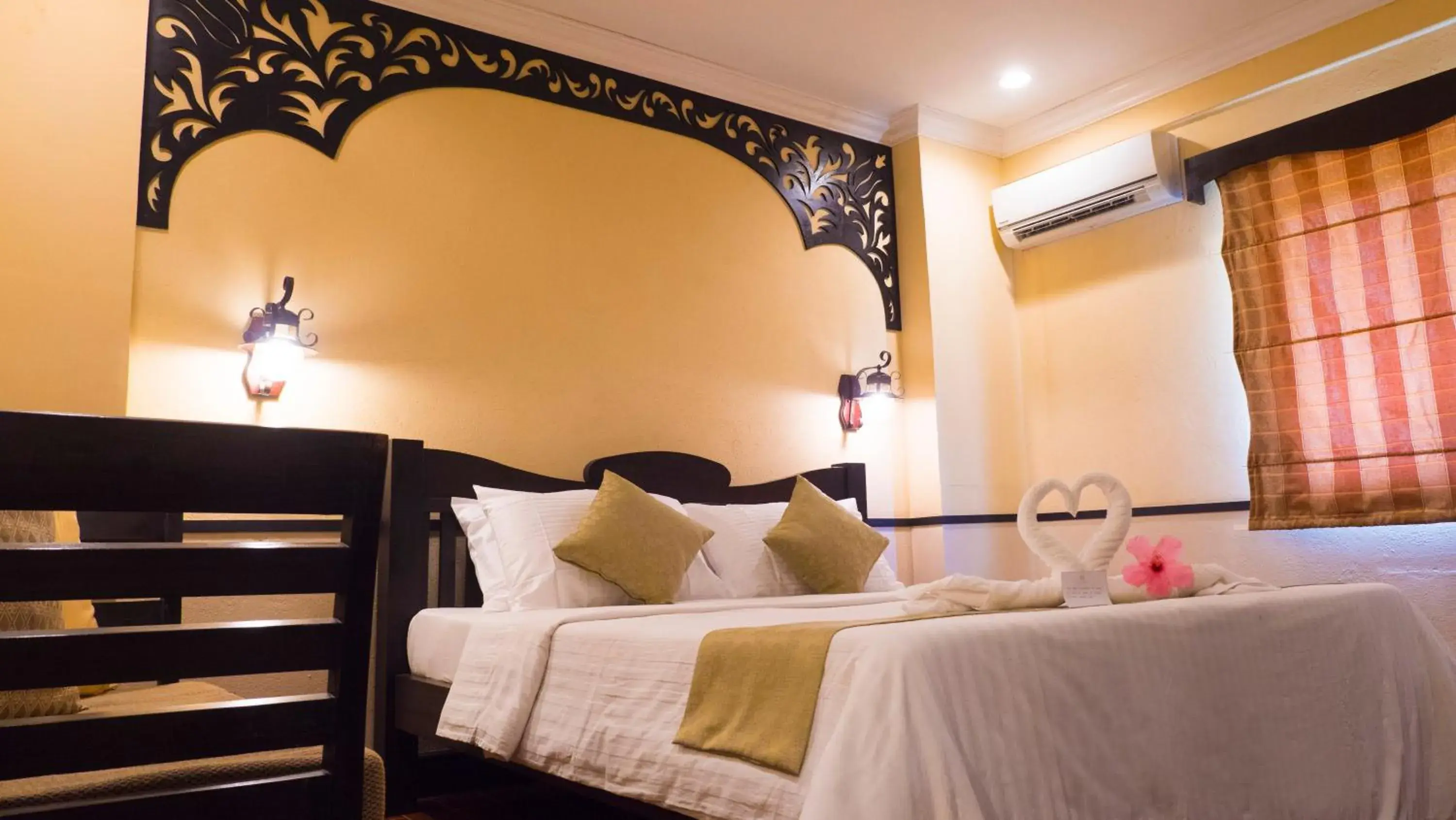 Bed in Playa Tropical Resort Hotel