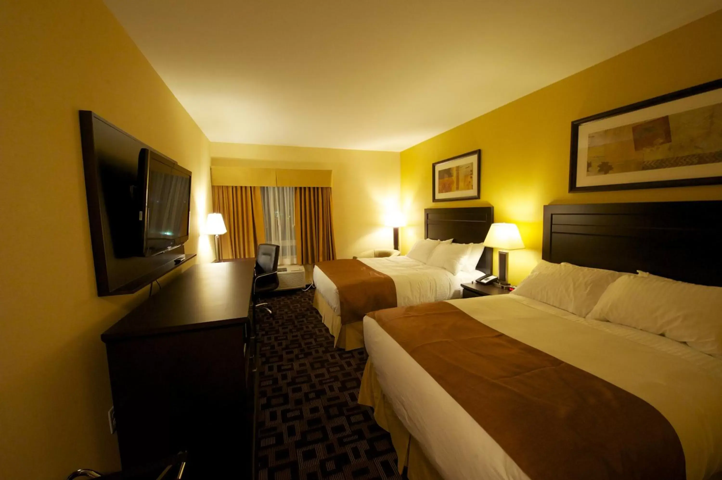 Photo of the whole room, Bed in Days Inn & Suites by Wyndham Winnipeg Airport Manitoba