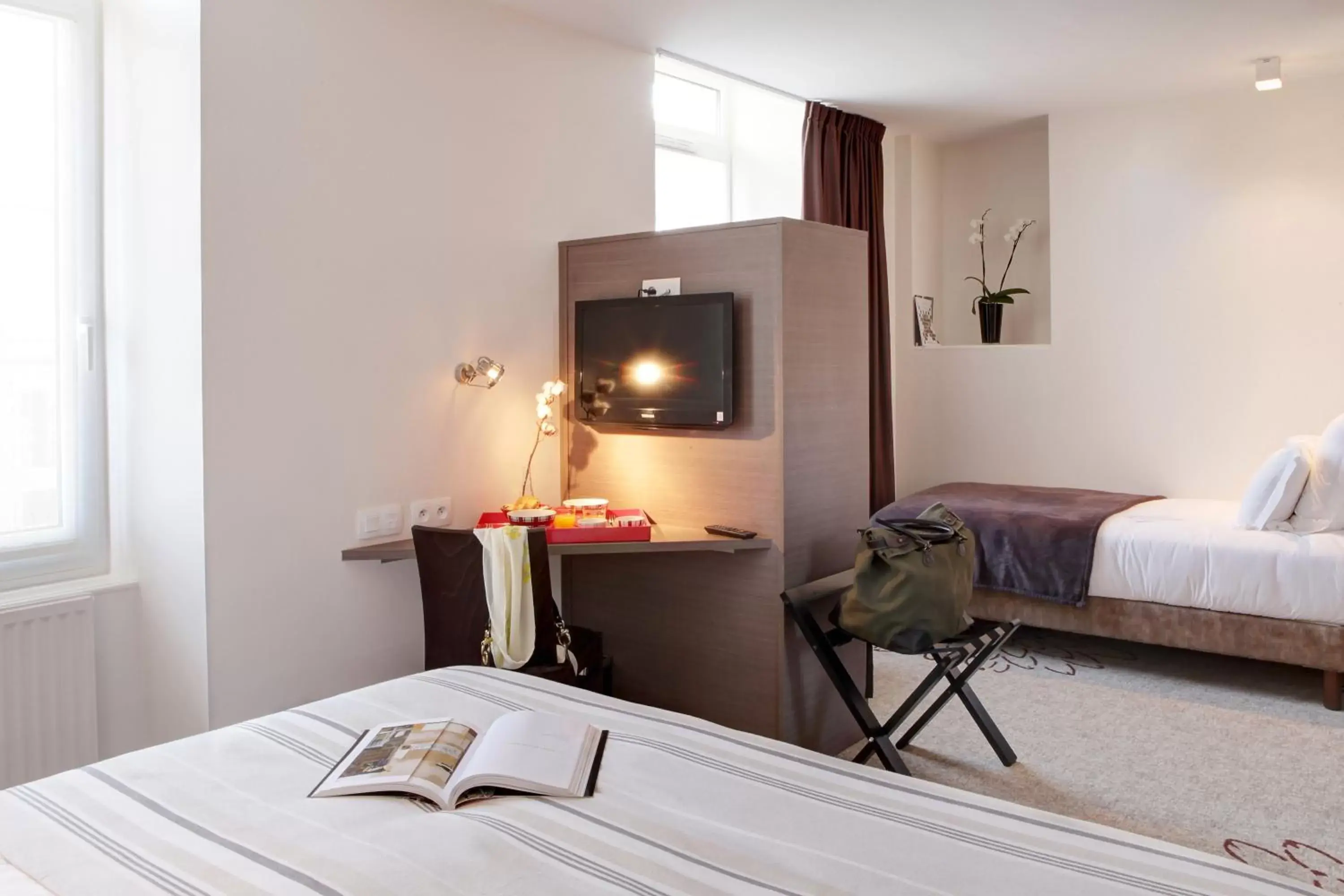 Deluxe Triple Room - single occupancy in Hôtel Le Benhuyc Deluxe Triple Room - single occupancy in Hôtel Le Benhuyc