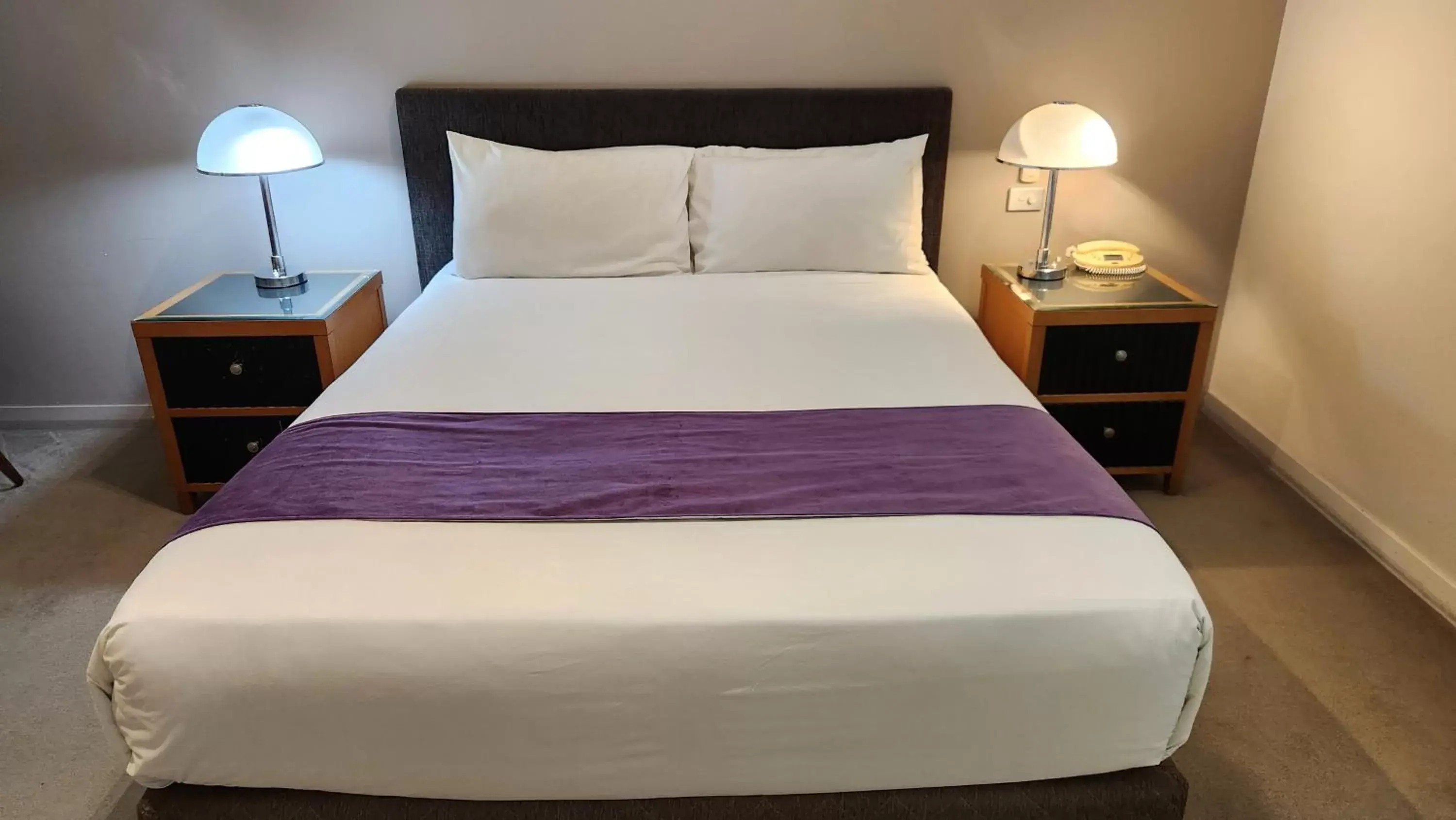 Bed in The Grand Motel