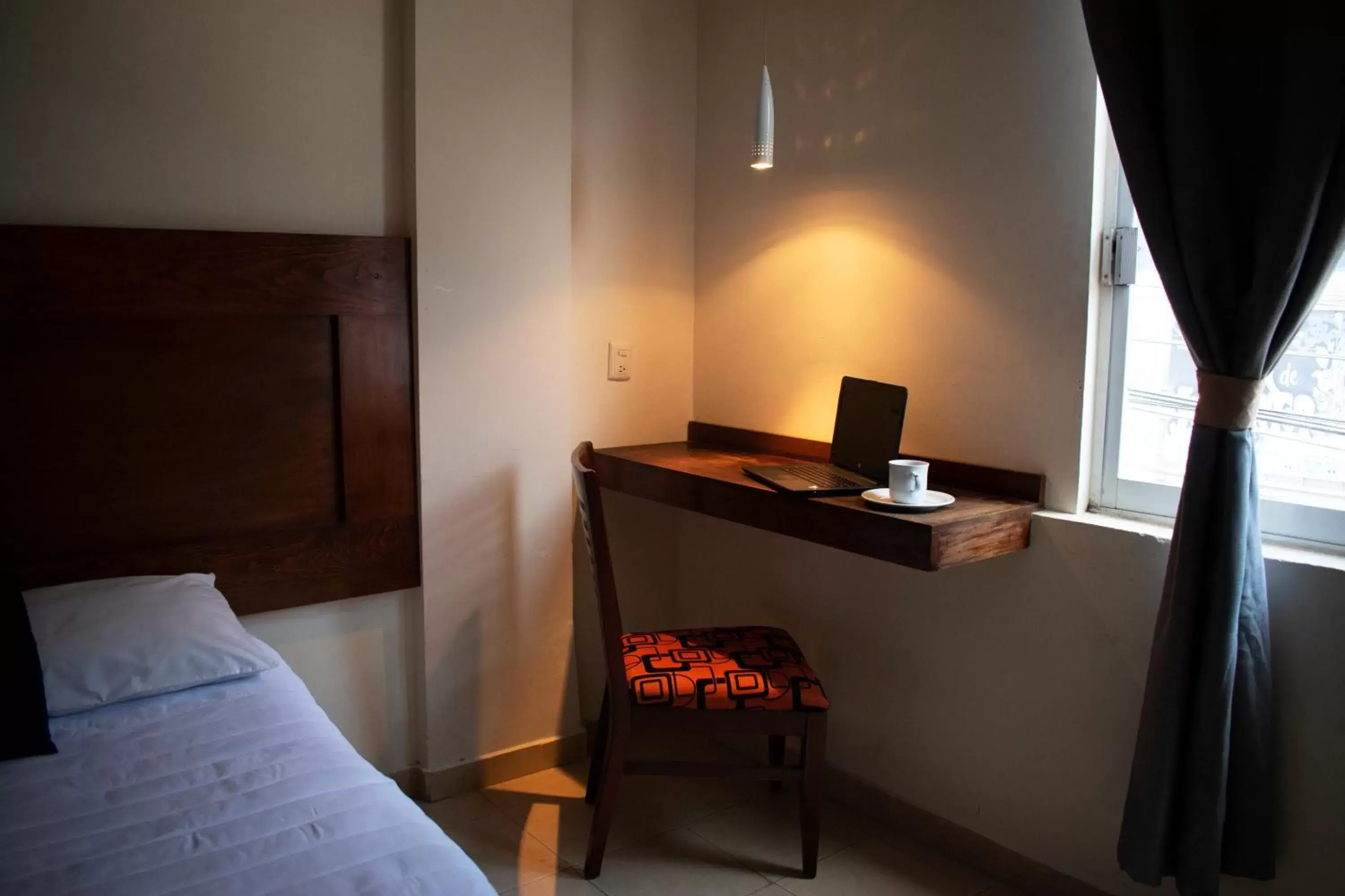 Bedroom, TV/Entertainment Center in Hotel Casa Blanca