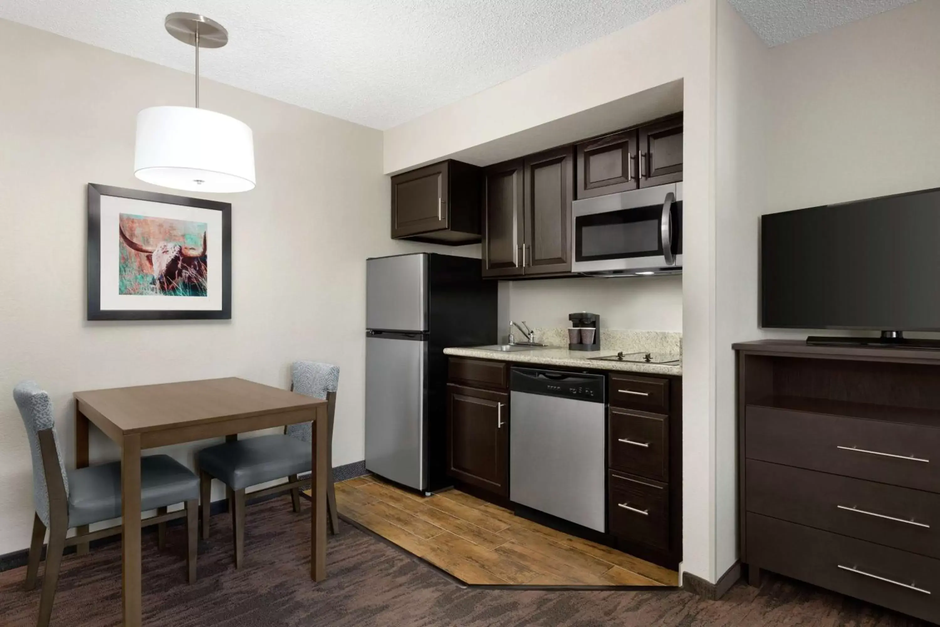 Bedroom, Kitchen/Kitchenette in Homewood Suites Dallas-Addison
