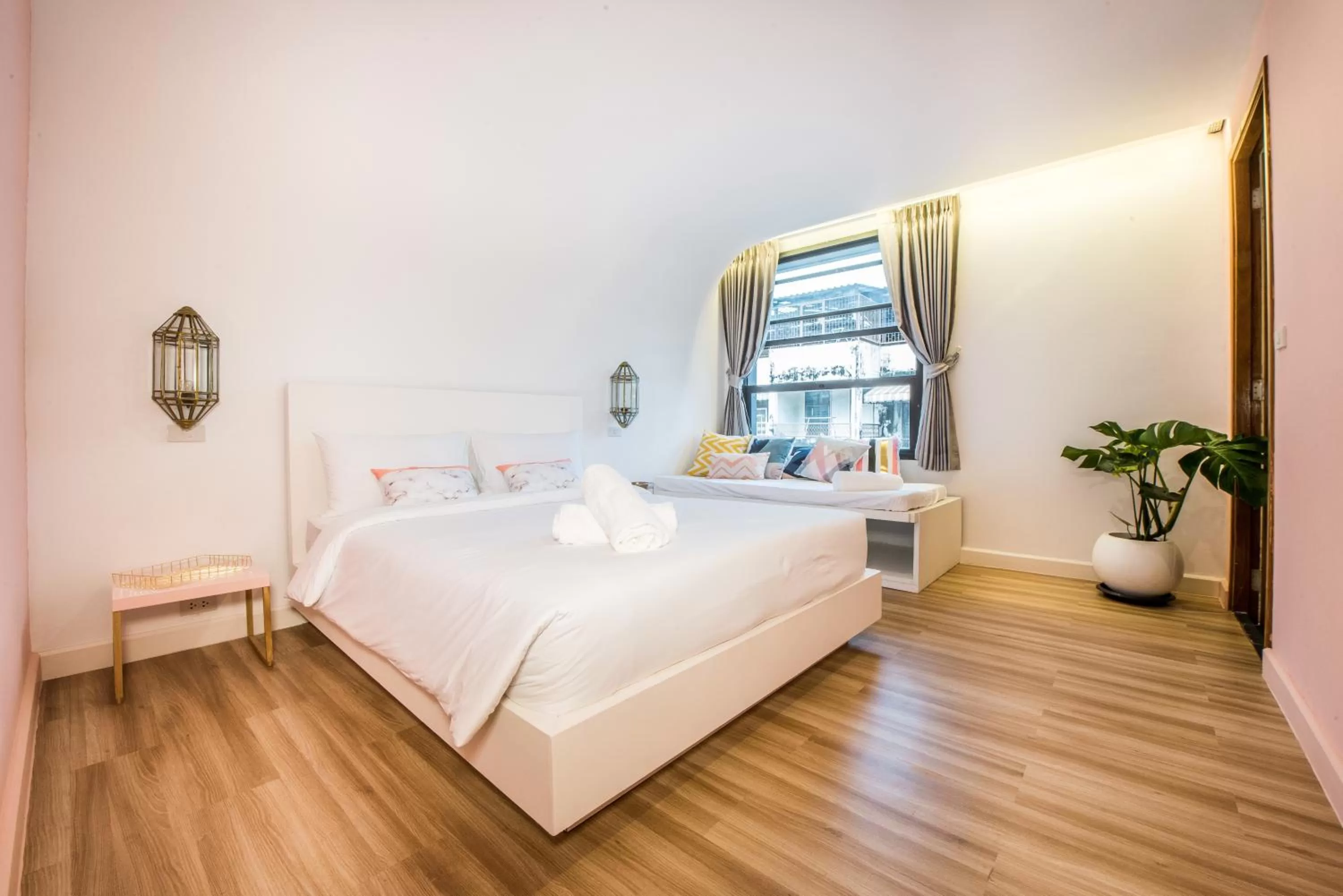 Bed in Nimit Boutique Hotel