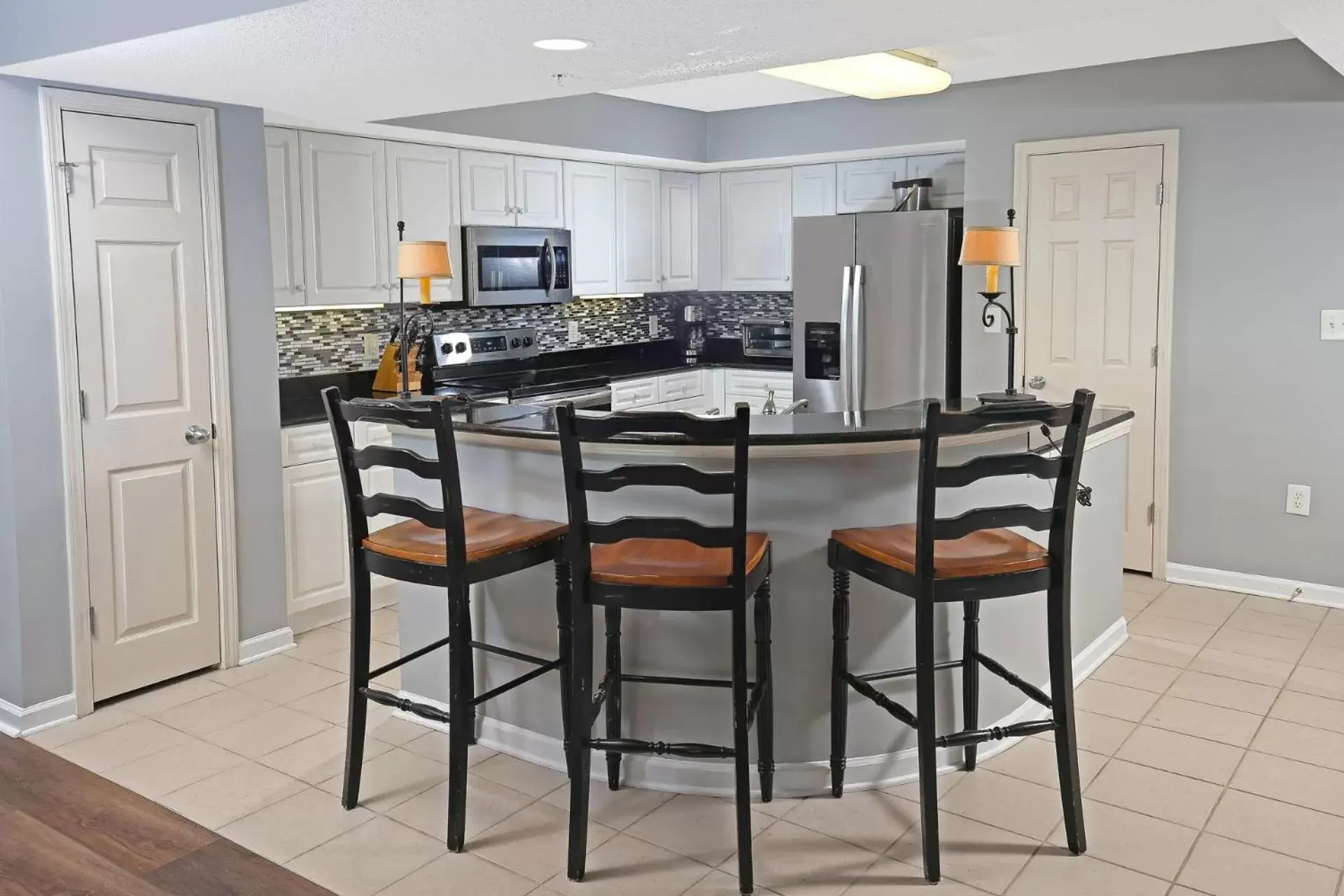 Kitchen or kitchenette, Dining Area in Barefoot Resort Golf & Yacht Club Villas