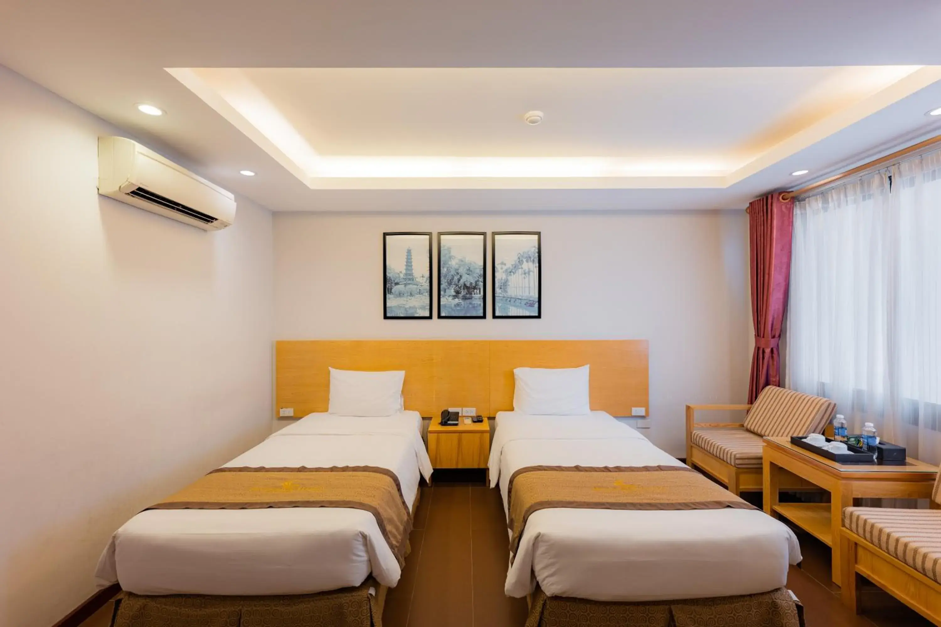 Bed in Riverside Hanoi Hotel