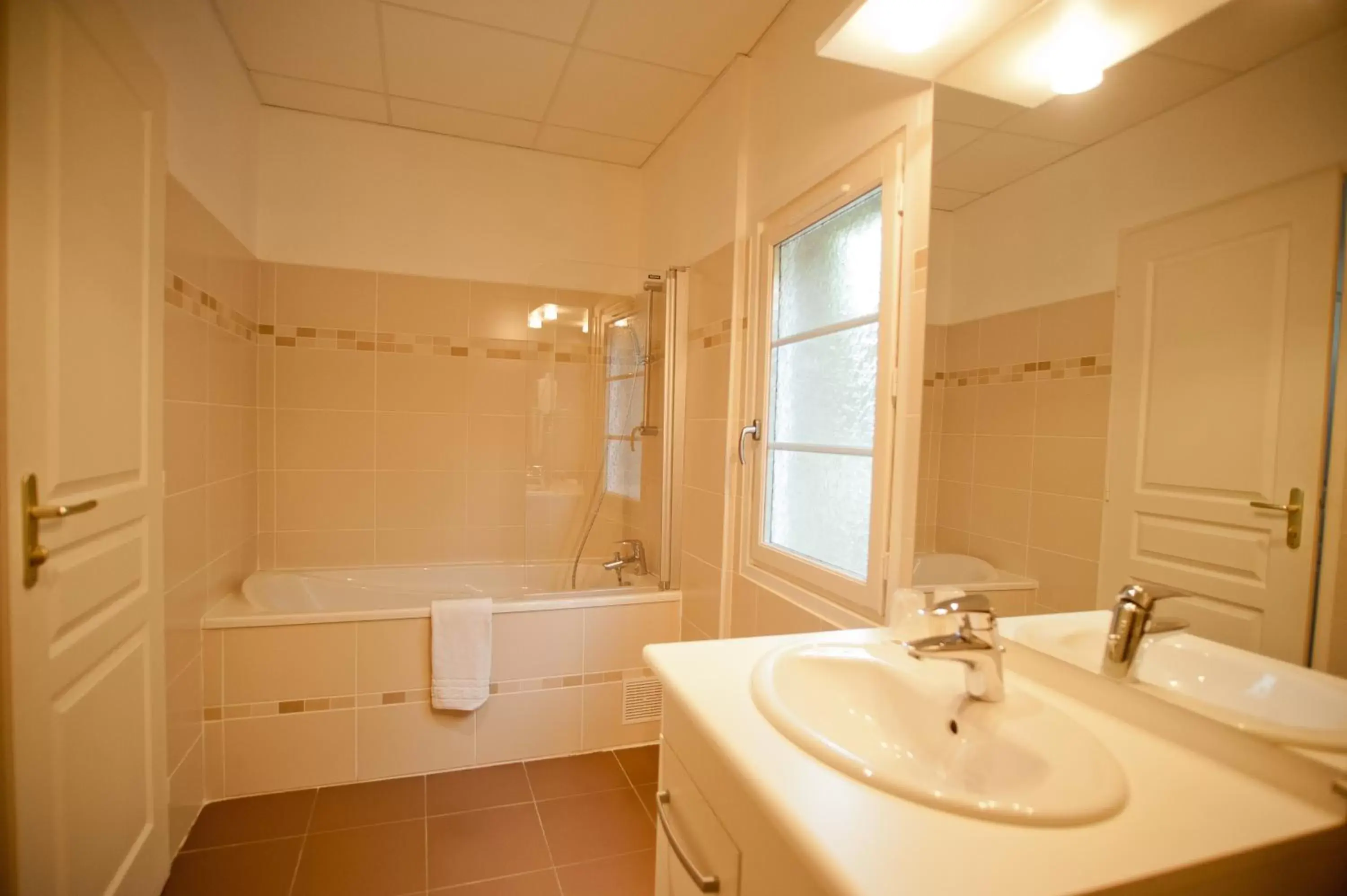 Bathroom in Logis Hotel Beaudon