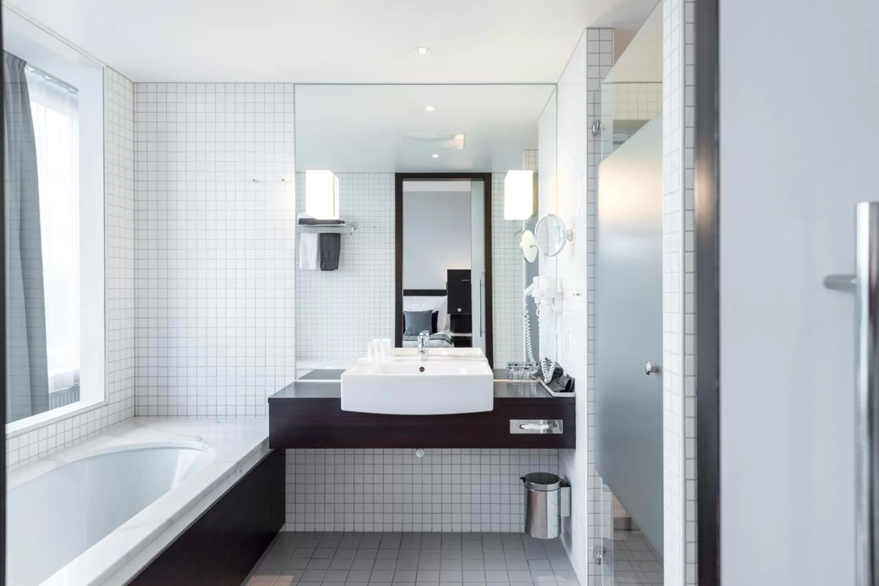 Bathroom, Bed in Clarion Hotel Stockholm Bathroom, Bed in Clarion Hotel Stockholm