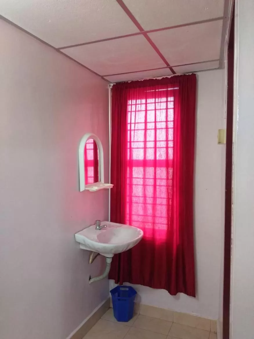Bathroom in Anandan Tourist Home