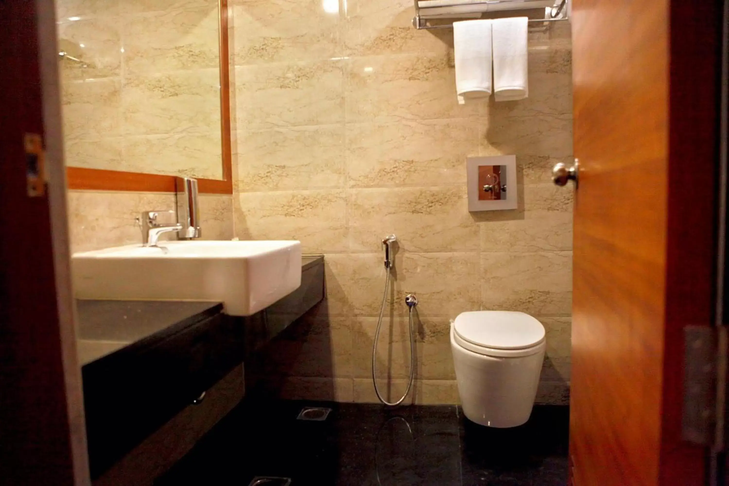 Bathroom in Lemon Tree Hotel Shimona Chennai