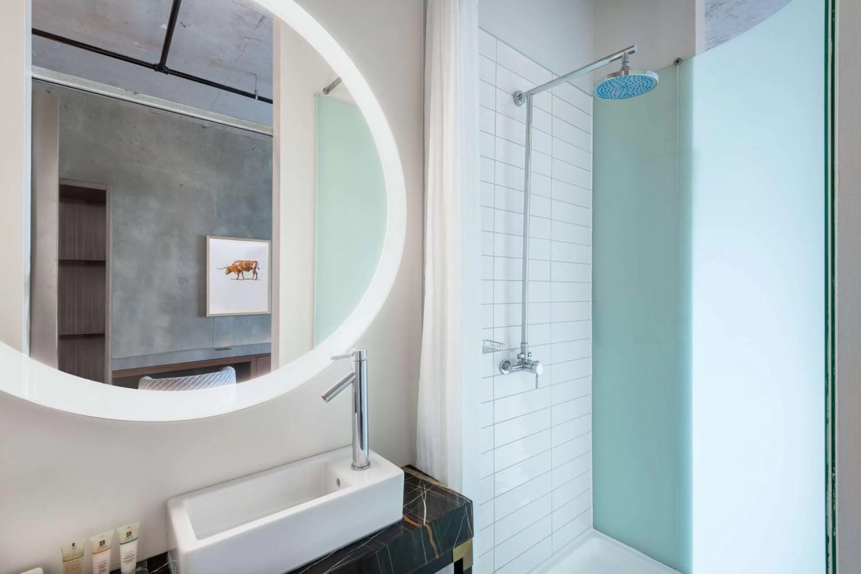 Bathroom in NYLO Dallas Plano Hotel, Tapestry Collection by Hilton