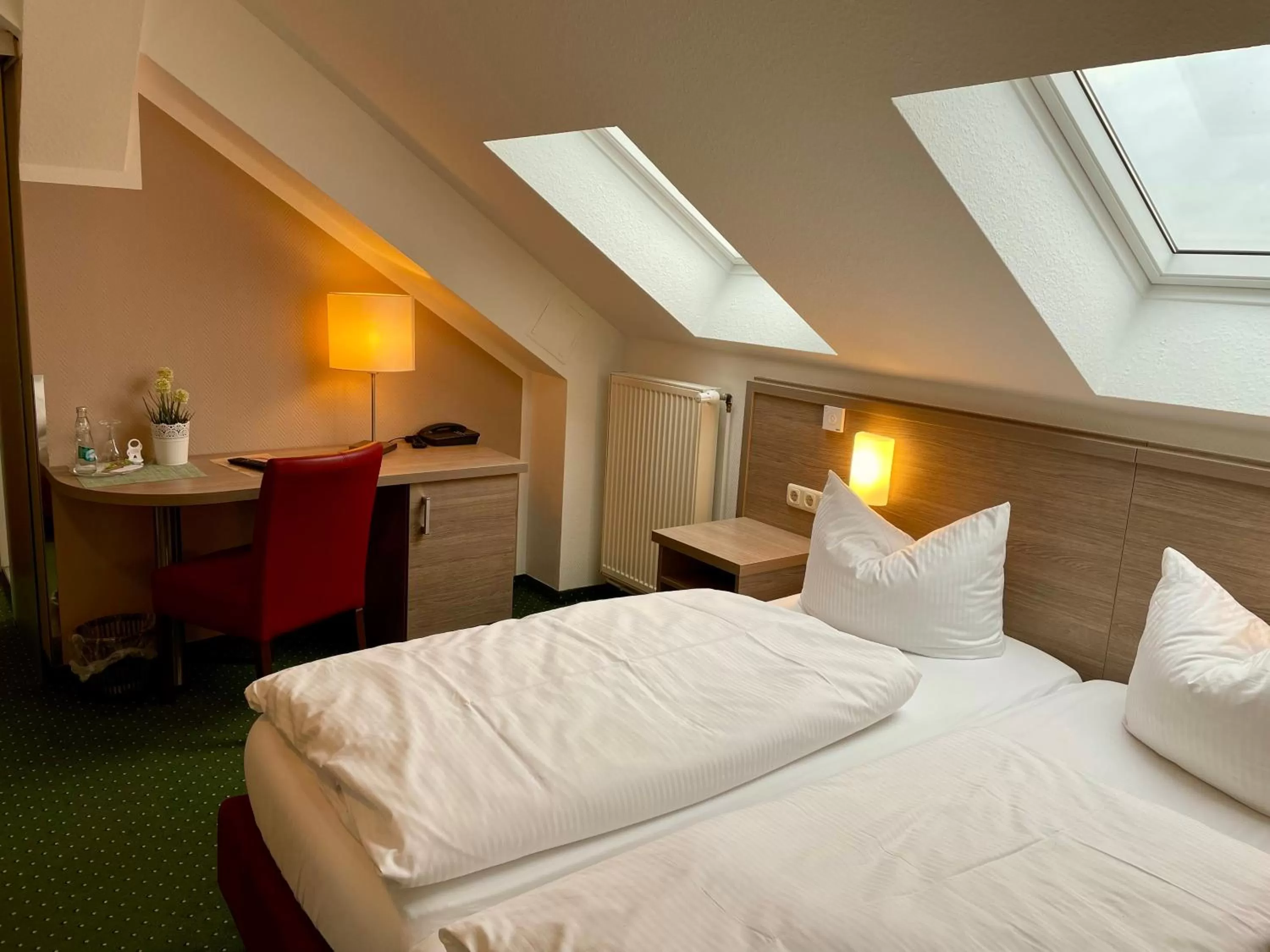 Photo of the whole room, Bed in Gasthof Scharfe Kurve