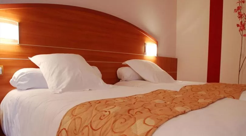 Bed in Hotel Cigoland