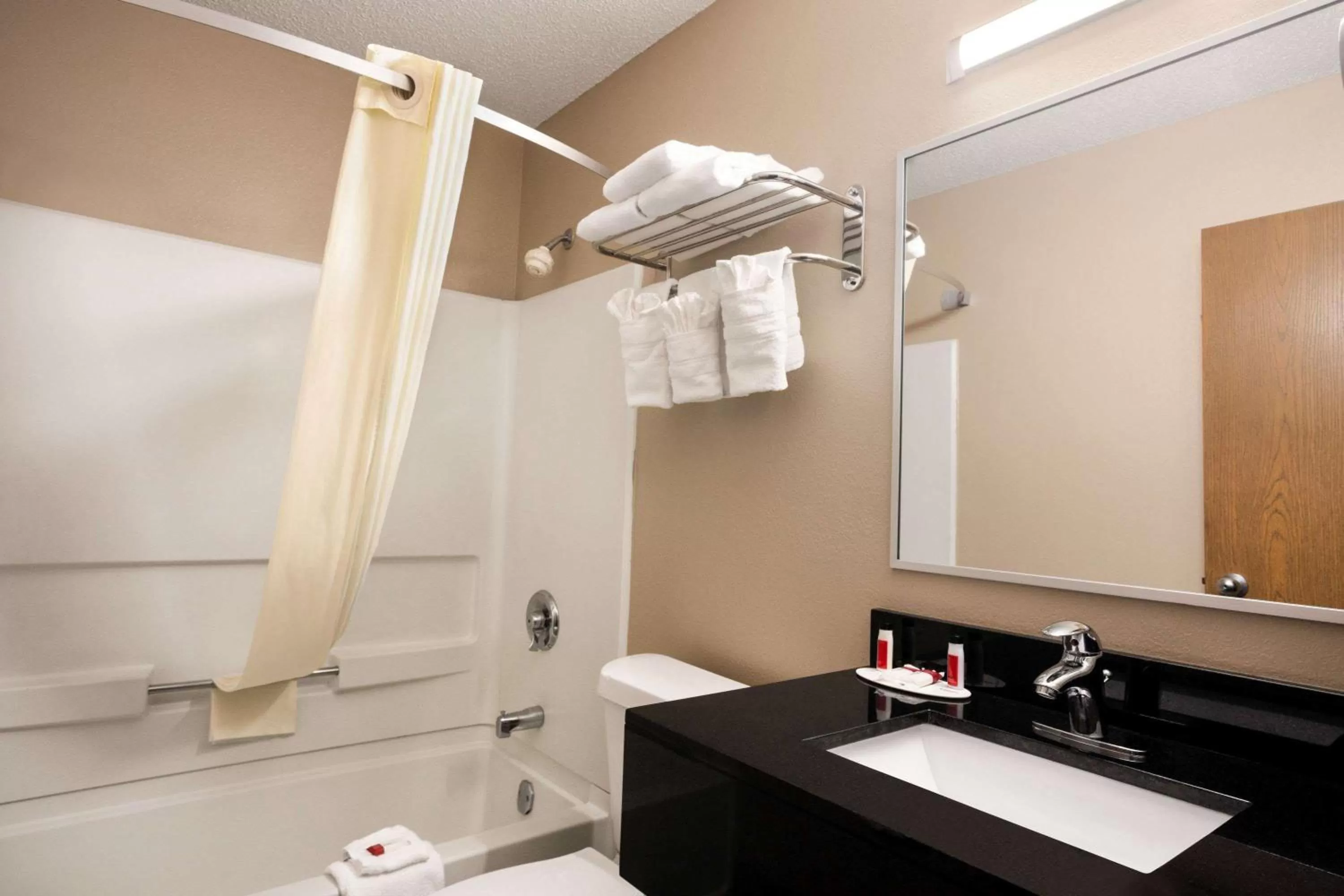 Bathroom in Super 8 by Wyndham Mayfield