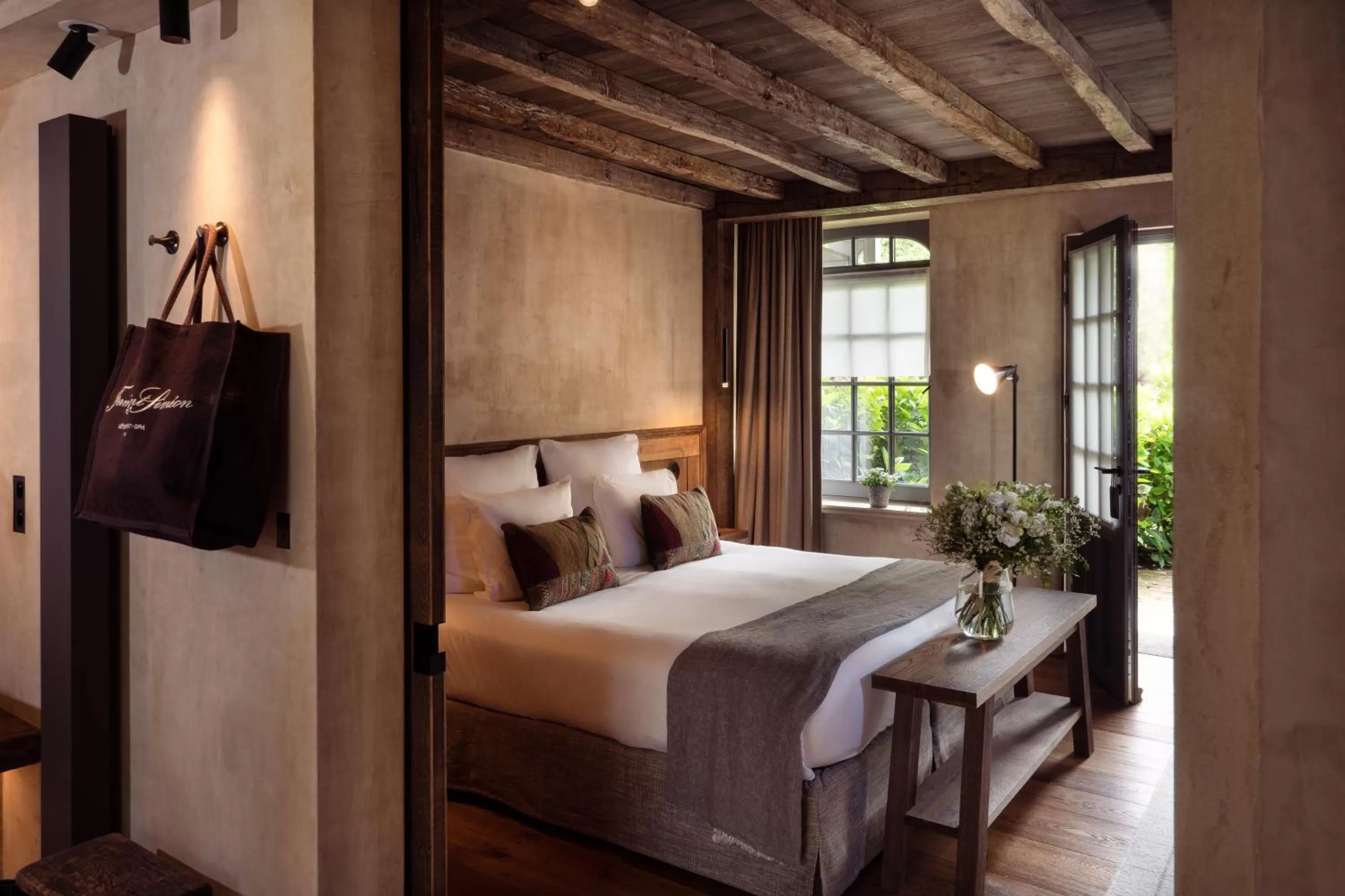 Patio, Bed in La Ferme Saint Simeon Hotel & Spa - Relais & Chateaux