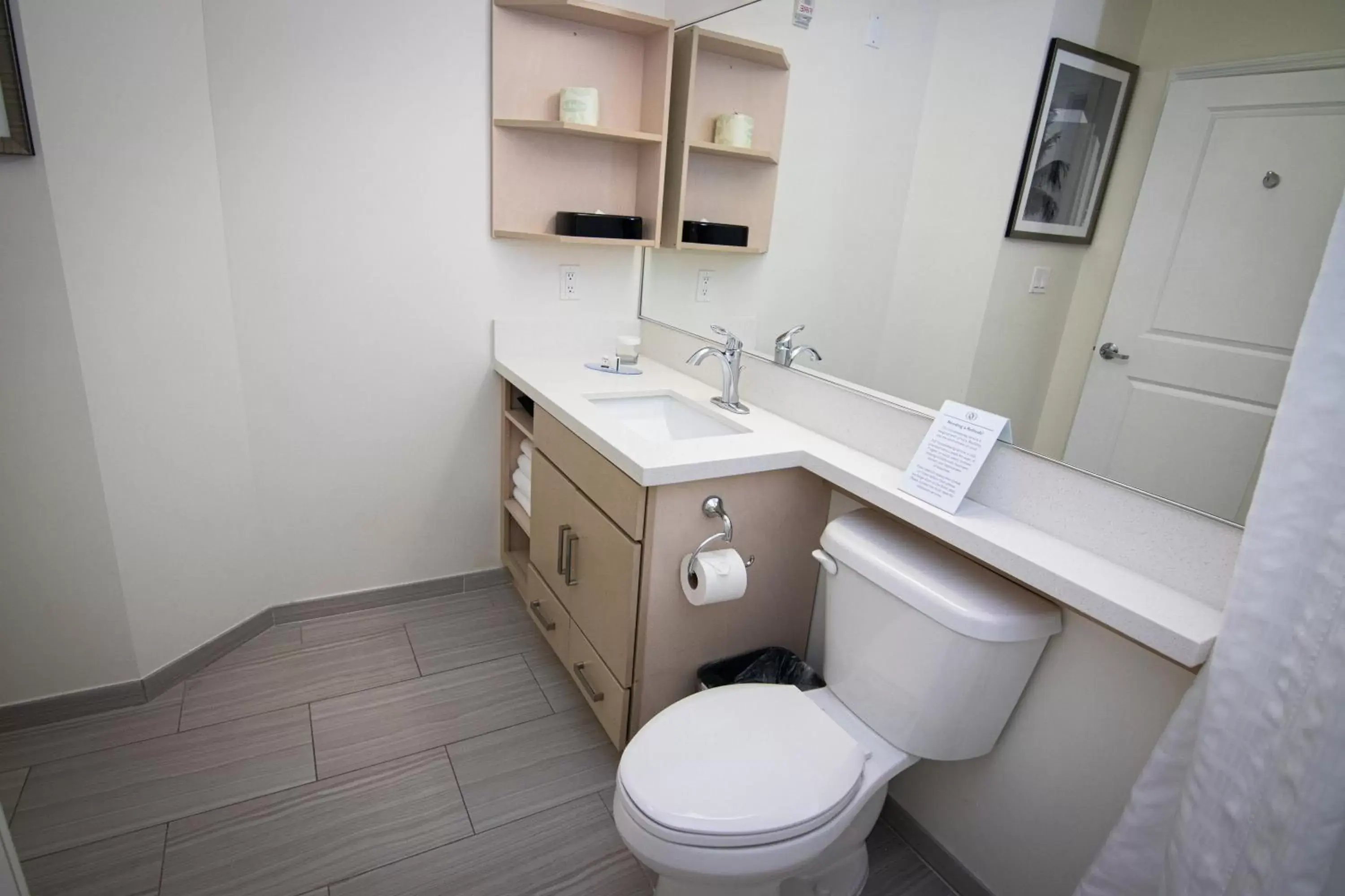 Toilet, Bathroom in Candlewood Suites Miami Intl Airport - 36th St, an IHG Hotel
