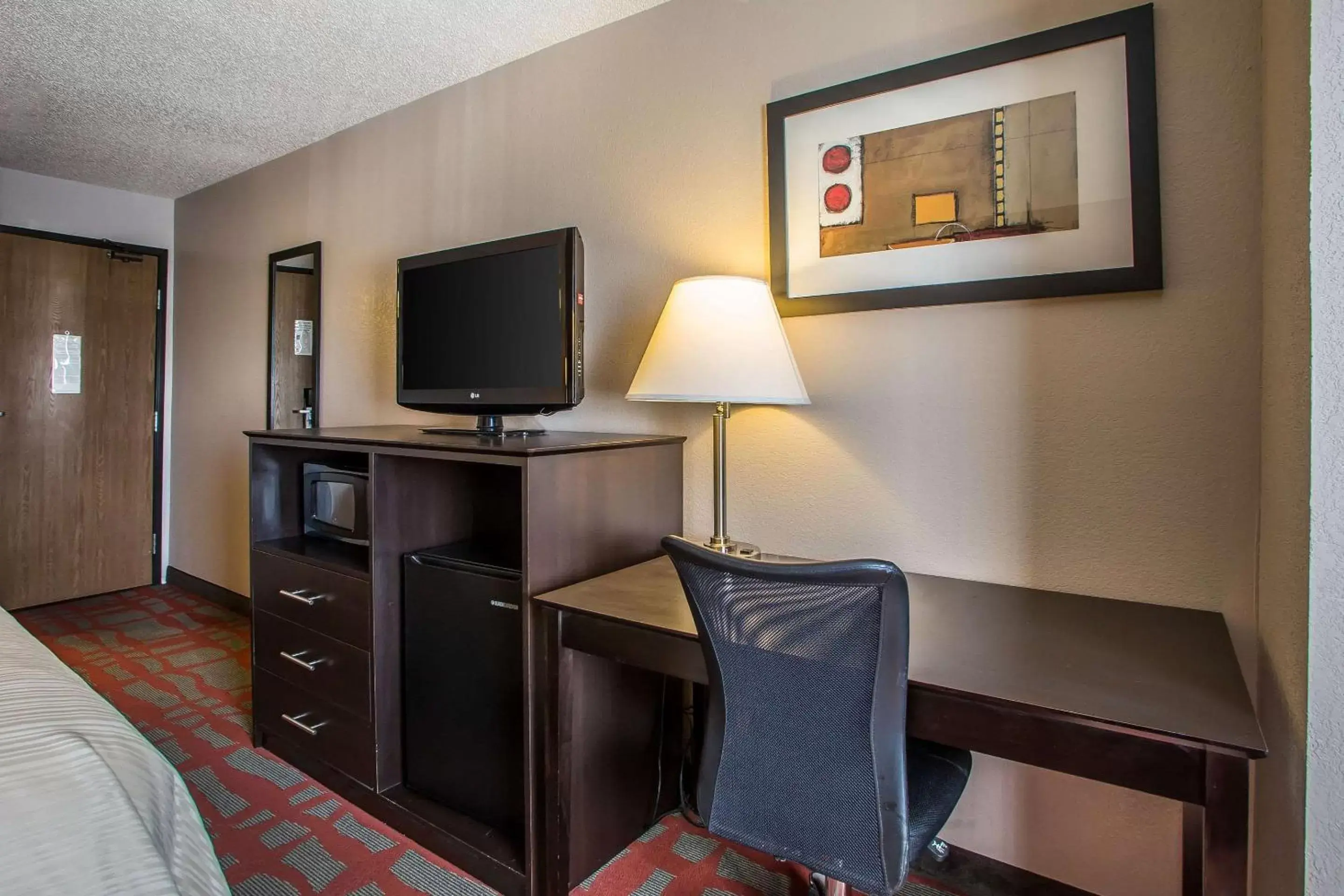 Photo of the whole room, TV/Entertainment Center in Quality Inn & Suites West Bend