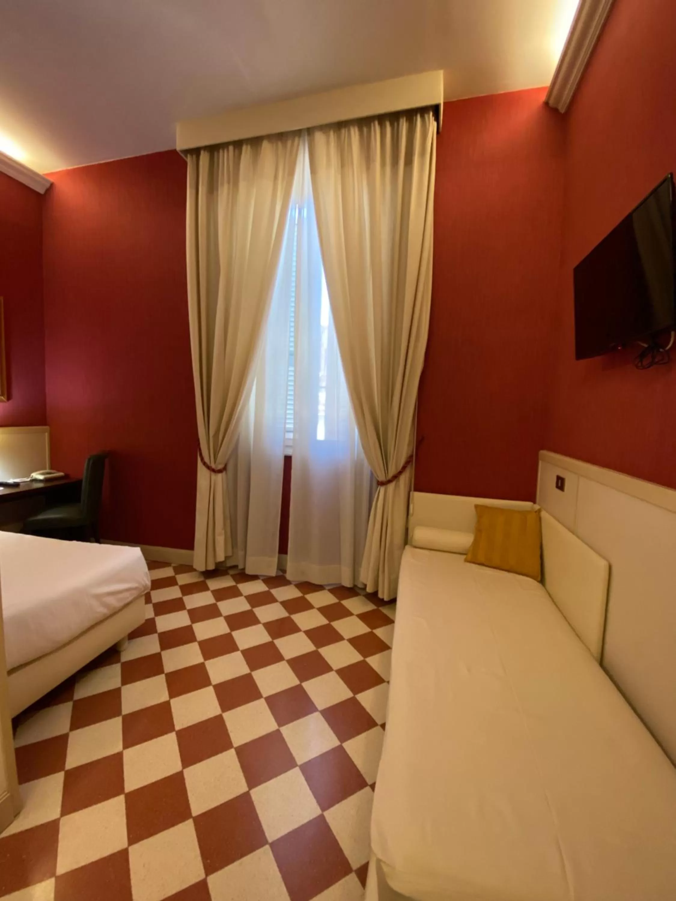 Bed in Basilica Hotel