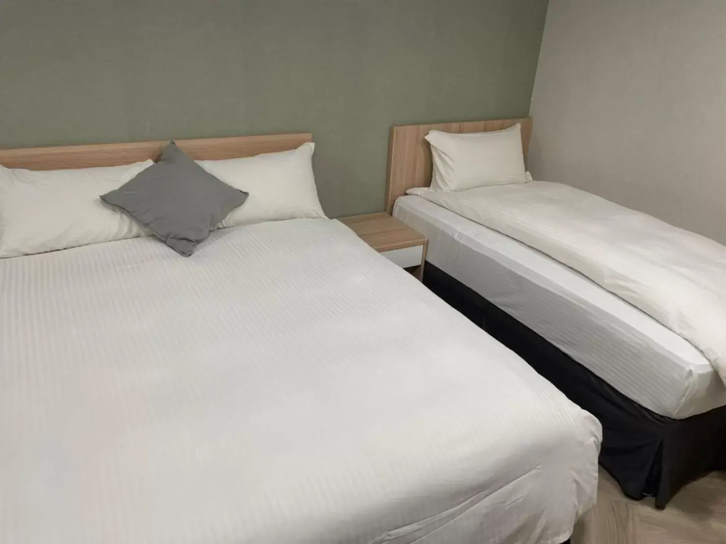 Bed in Mu Chen Hotel