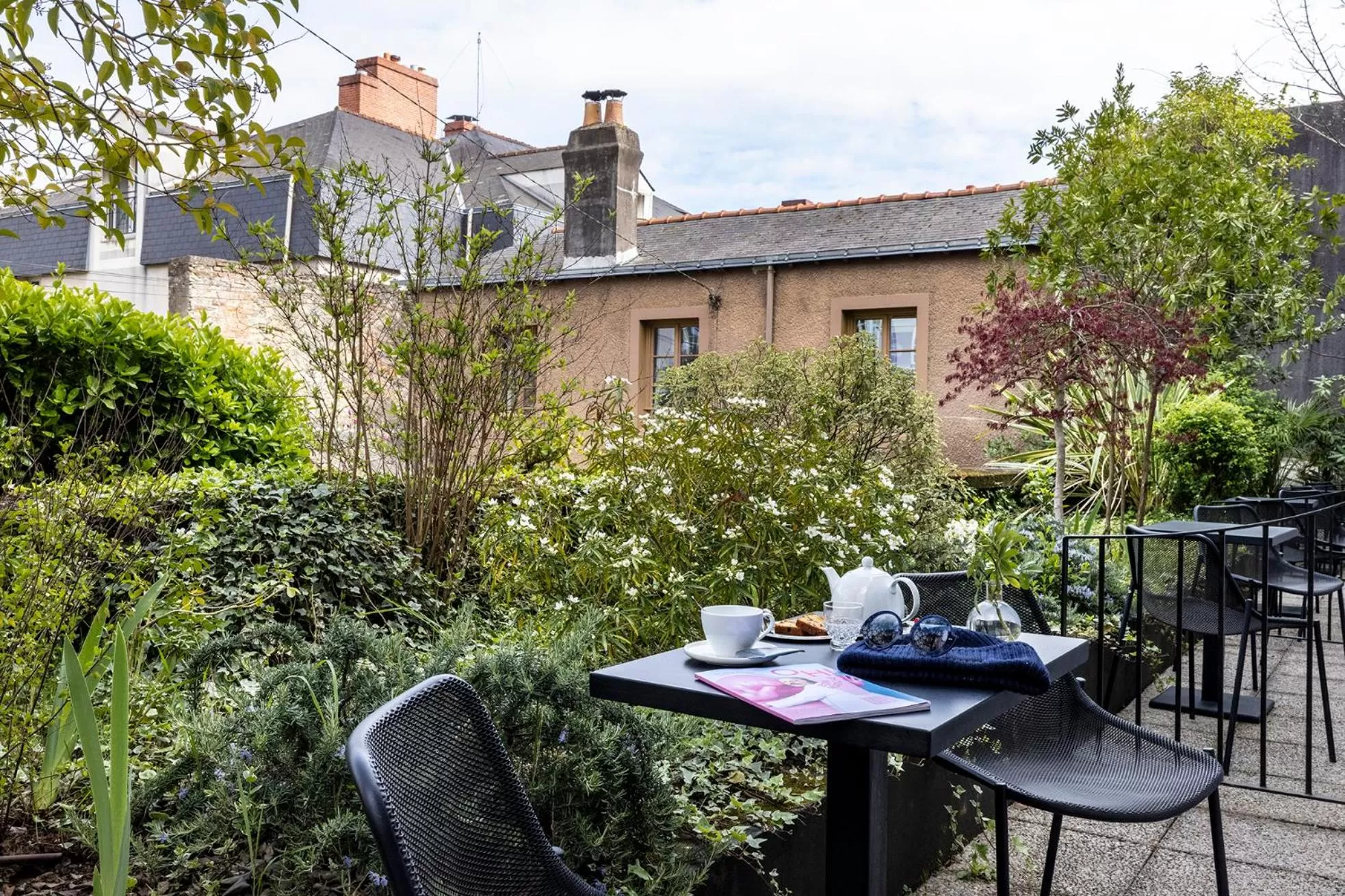 Patio in LHotel - face au château - boutique hôtel et séminaires