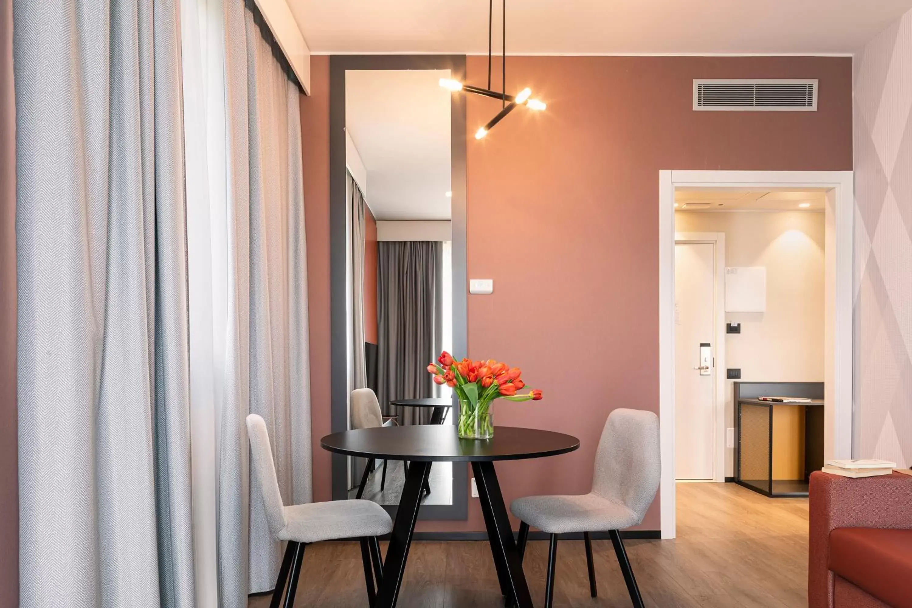 Bedroom, Dining Area in Quark Hotel Milano