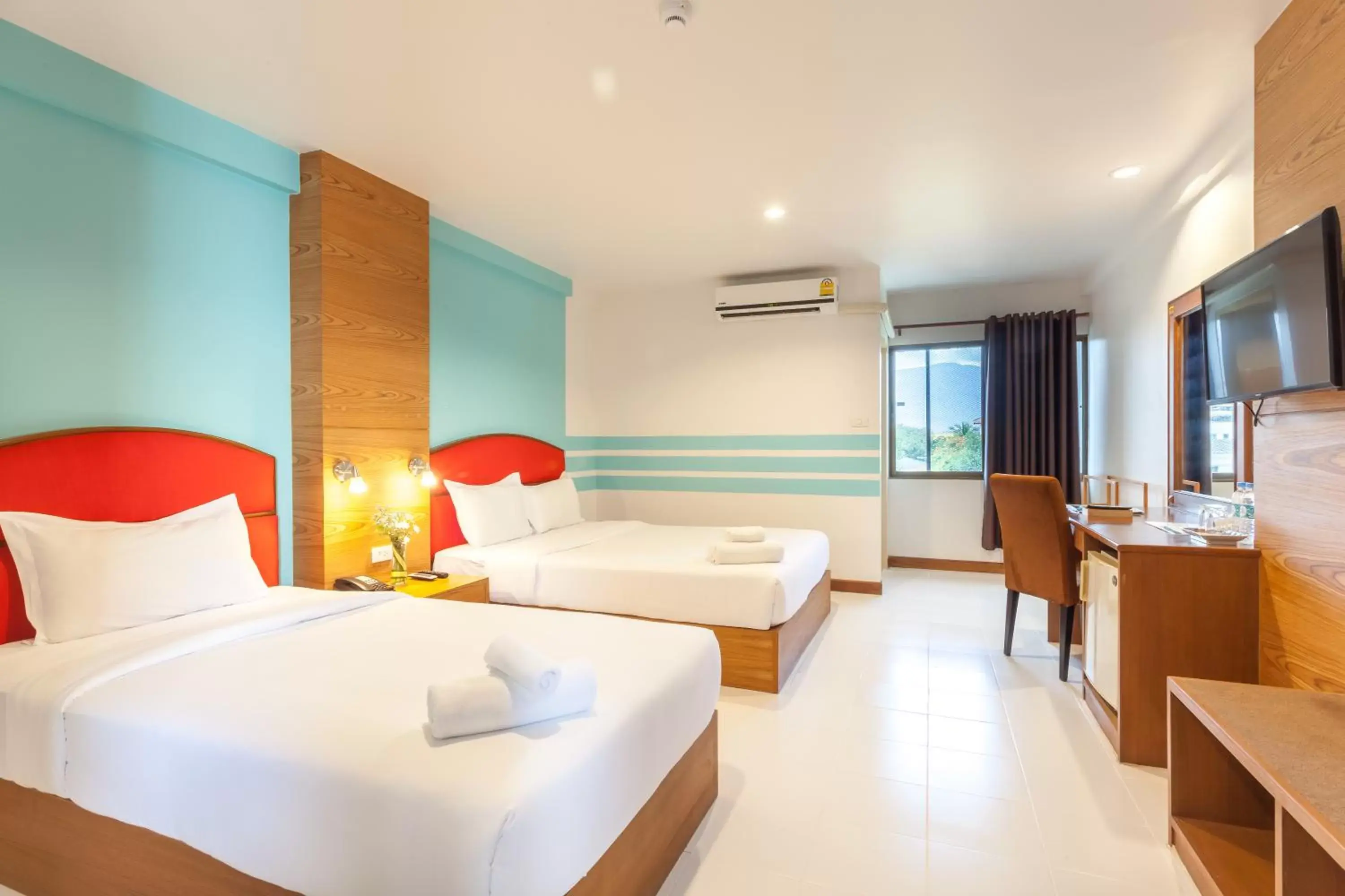 Deluxe Triple Room (Complimentary Coffee, Tea and Toast) in We Briza Hotel Chiangmai
