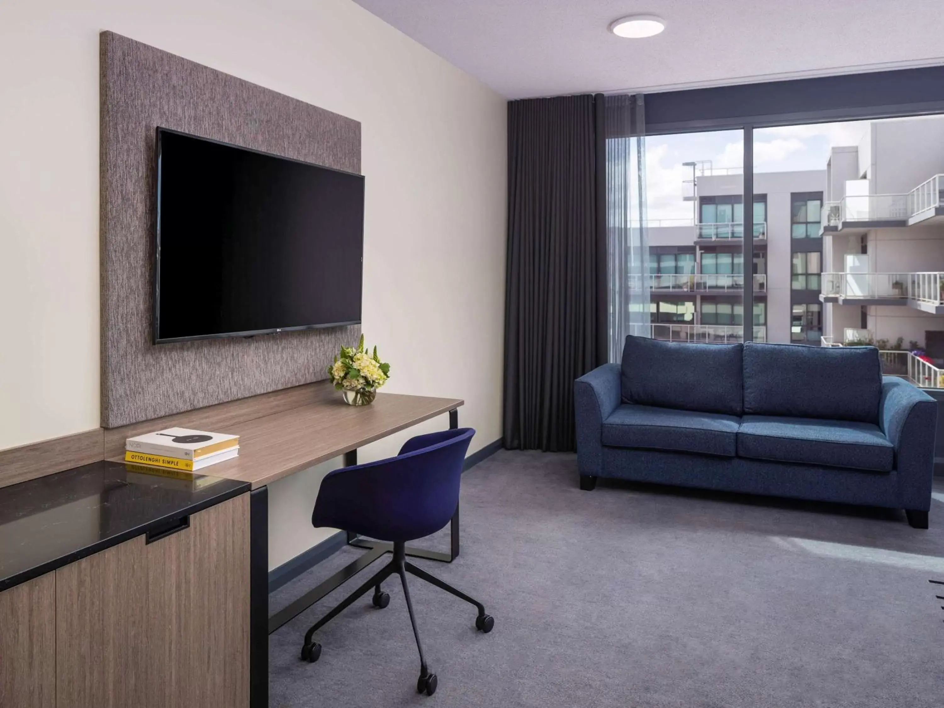 Photo of the whole room, TV/Entertainment Center in Novotel Geelong