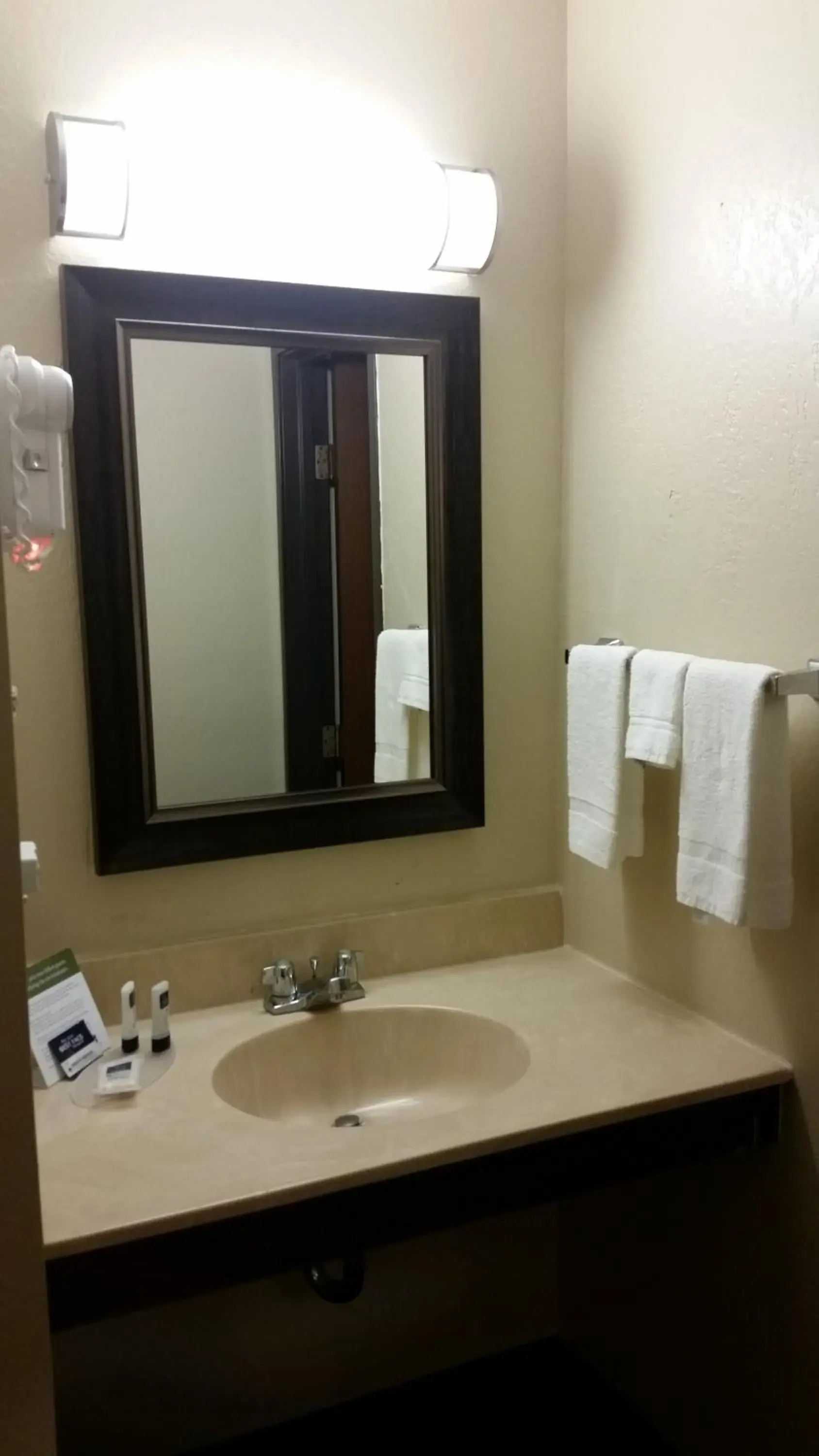 Bathroom in AmericInn by Wyndham Forest Lake