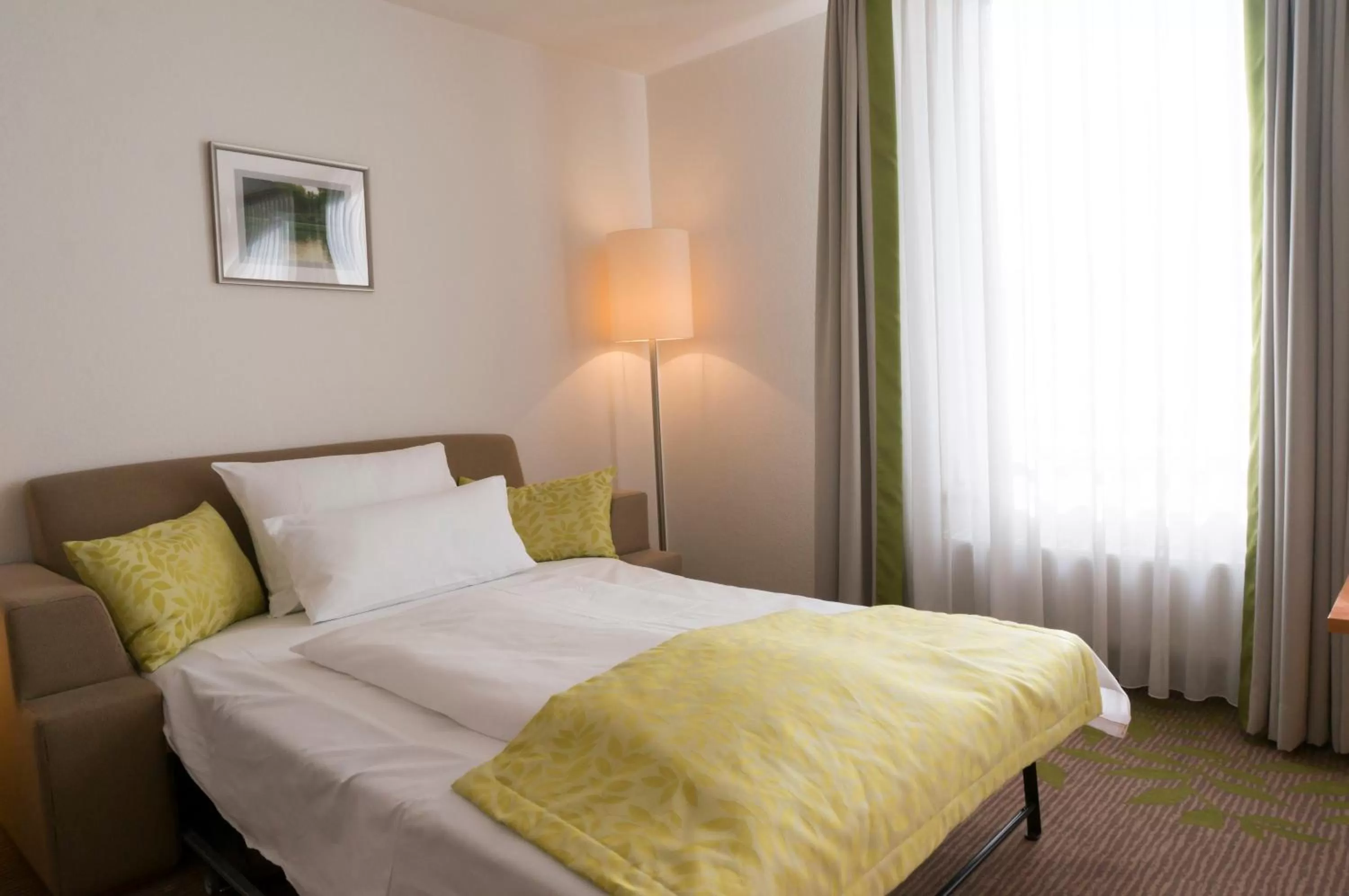 Bed in Hotel Mingarden