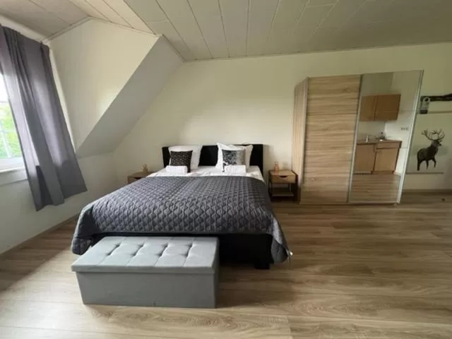 Bed in Hotel Rehkitz