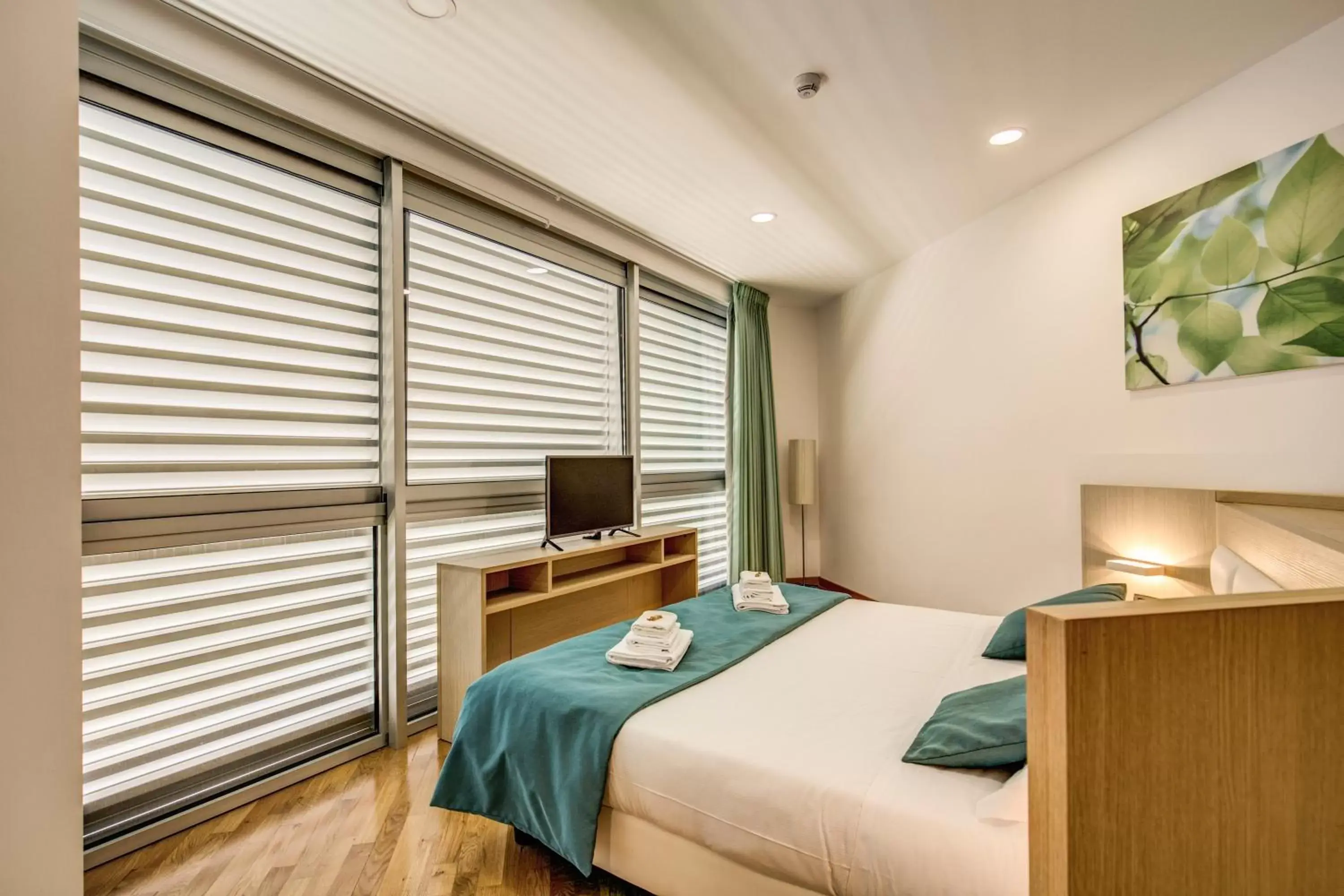 Photo of the whole room, Bed in Ginevra Palace Hotel Photo of the whole room, Bed in Ginevra Palace Hotel