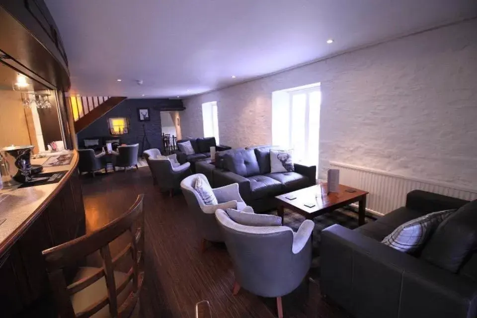 Lounge or bar in The Mill House Hotel