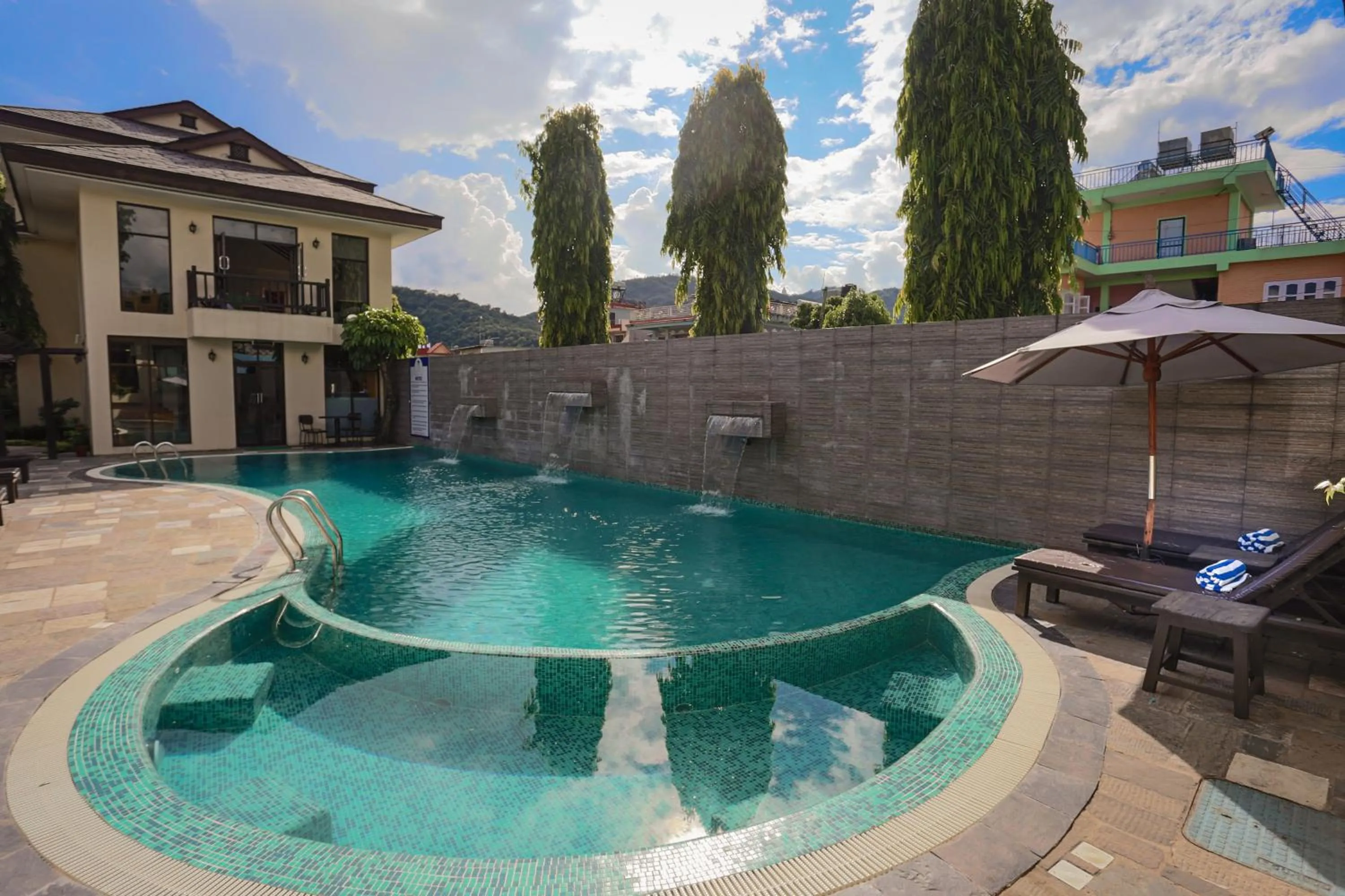 Swimming pool in Atithi Resort & Spa