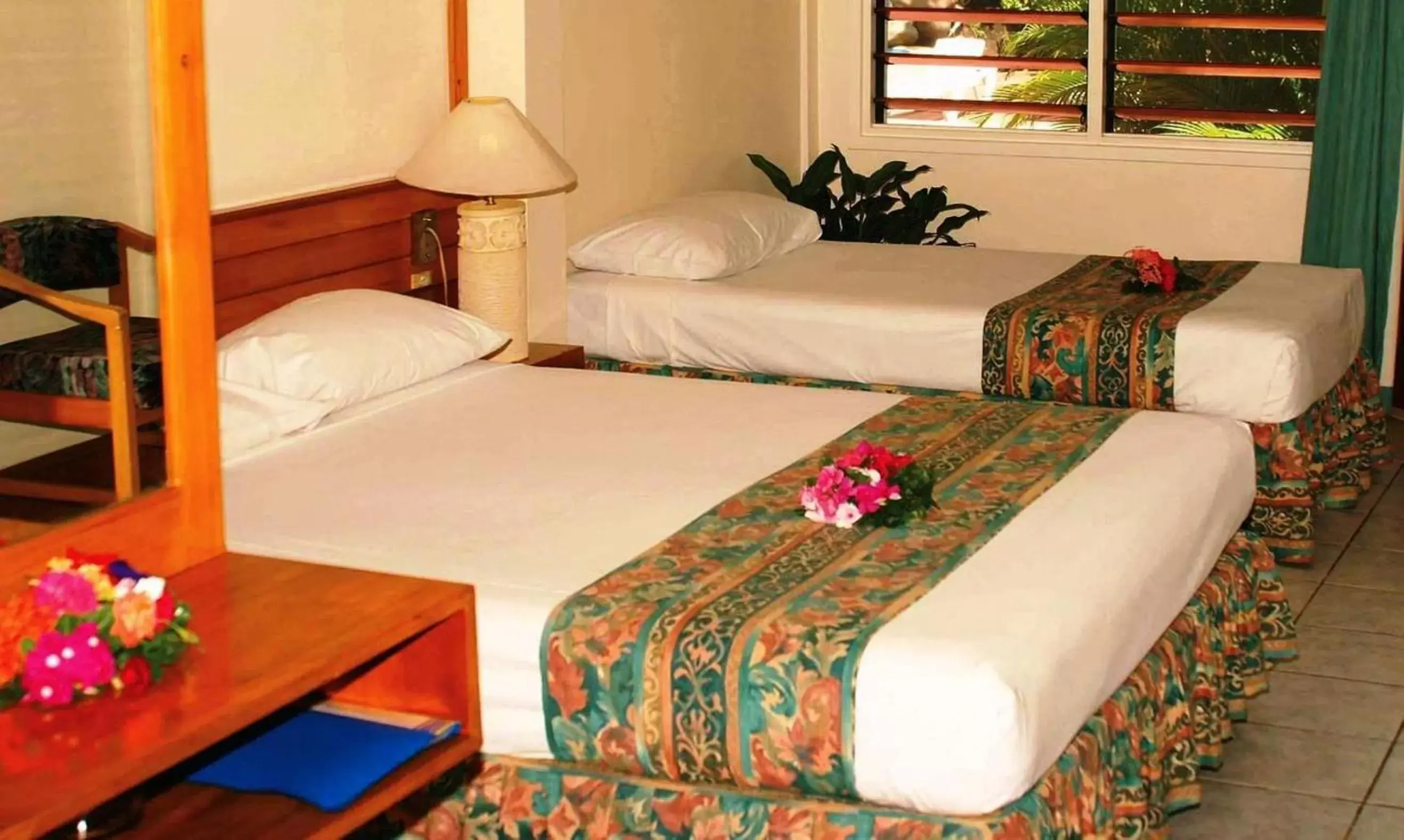 Bed in Hexagon International Hotel, Villas & Spa