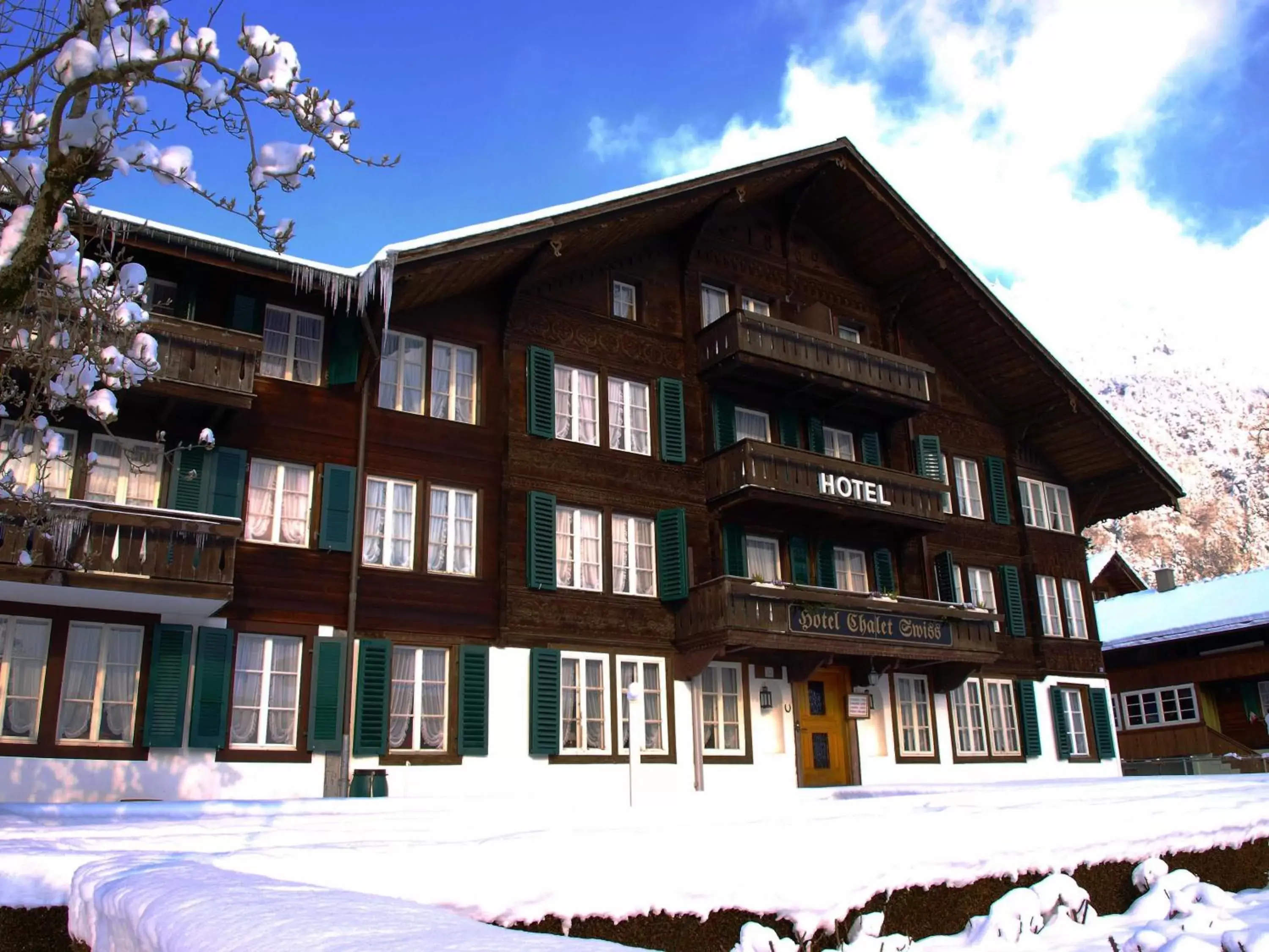 Property building, Winter in Hotel Chalet Swiss