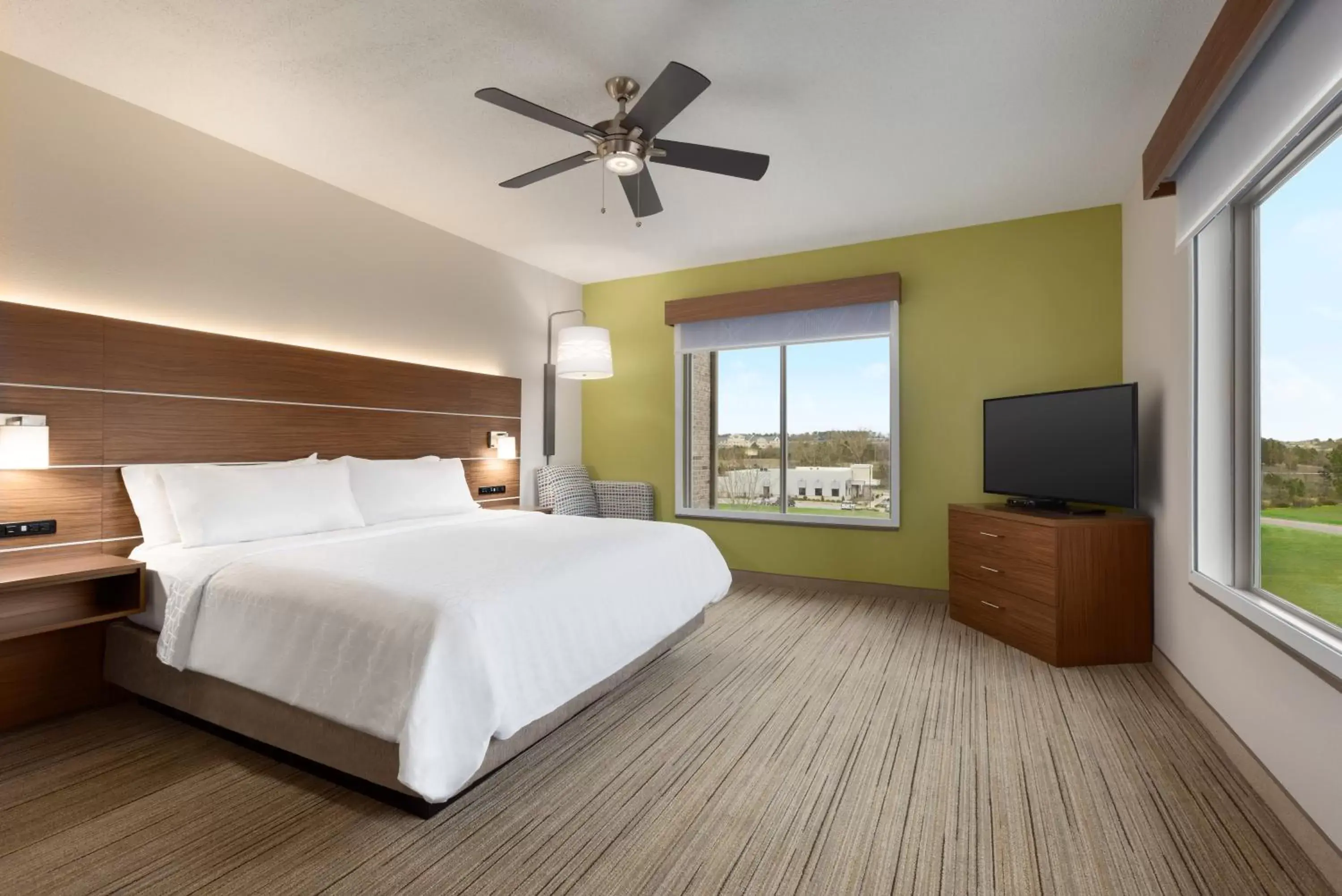Bed in Holiday Inn Express Hotel & Suites Opelika Auburn, an IHG Hotel