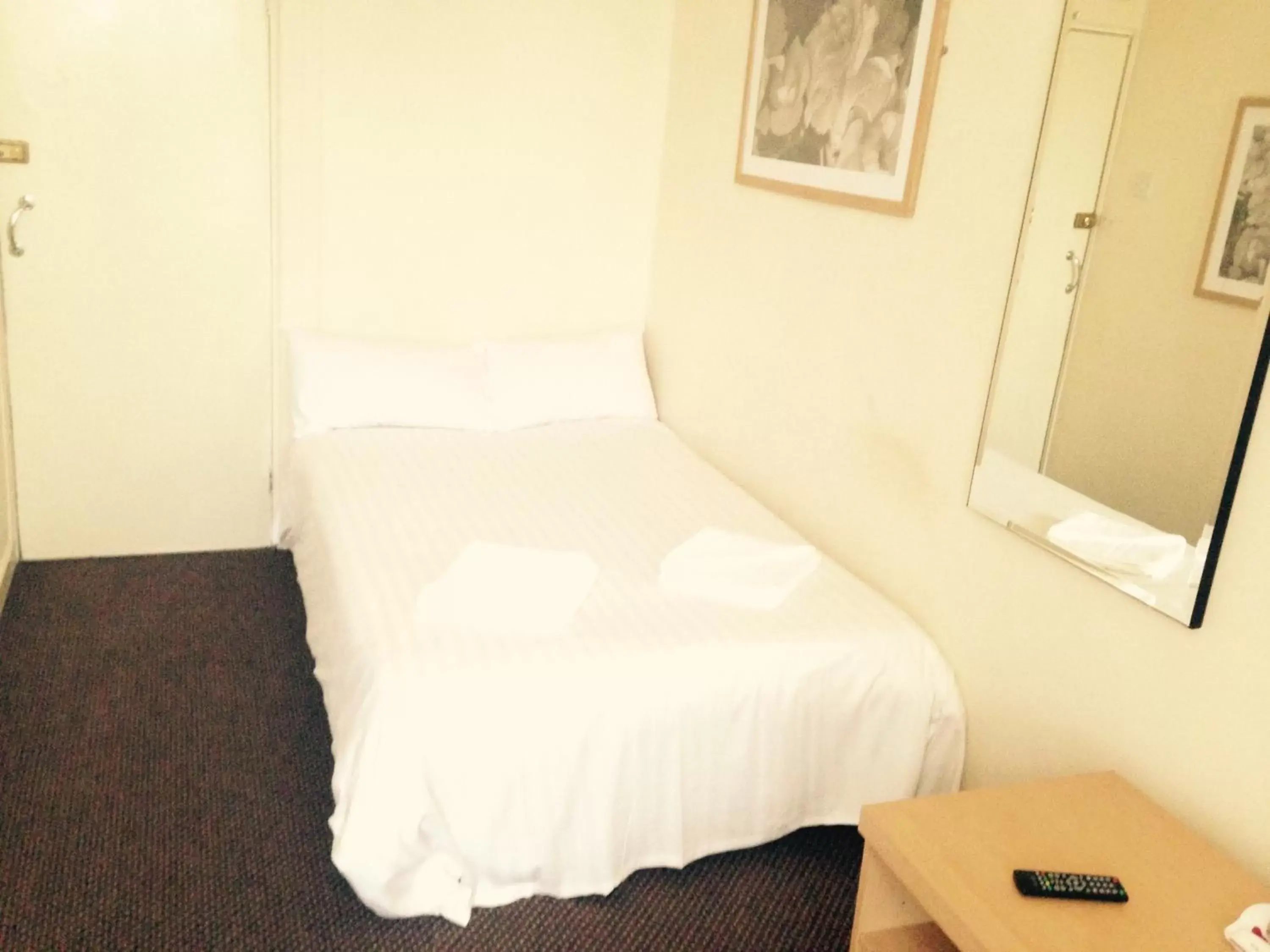 Bed in Peek-a-Booze - Budget Hotel - Adults Only