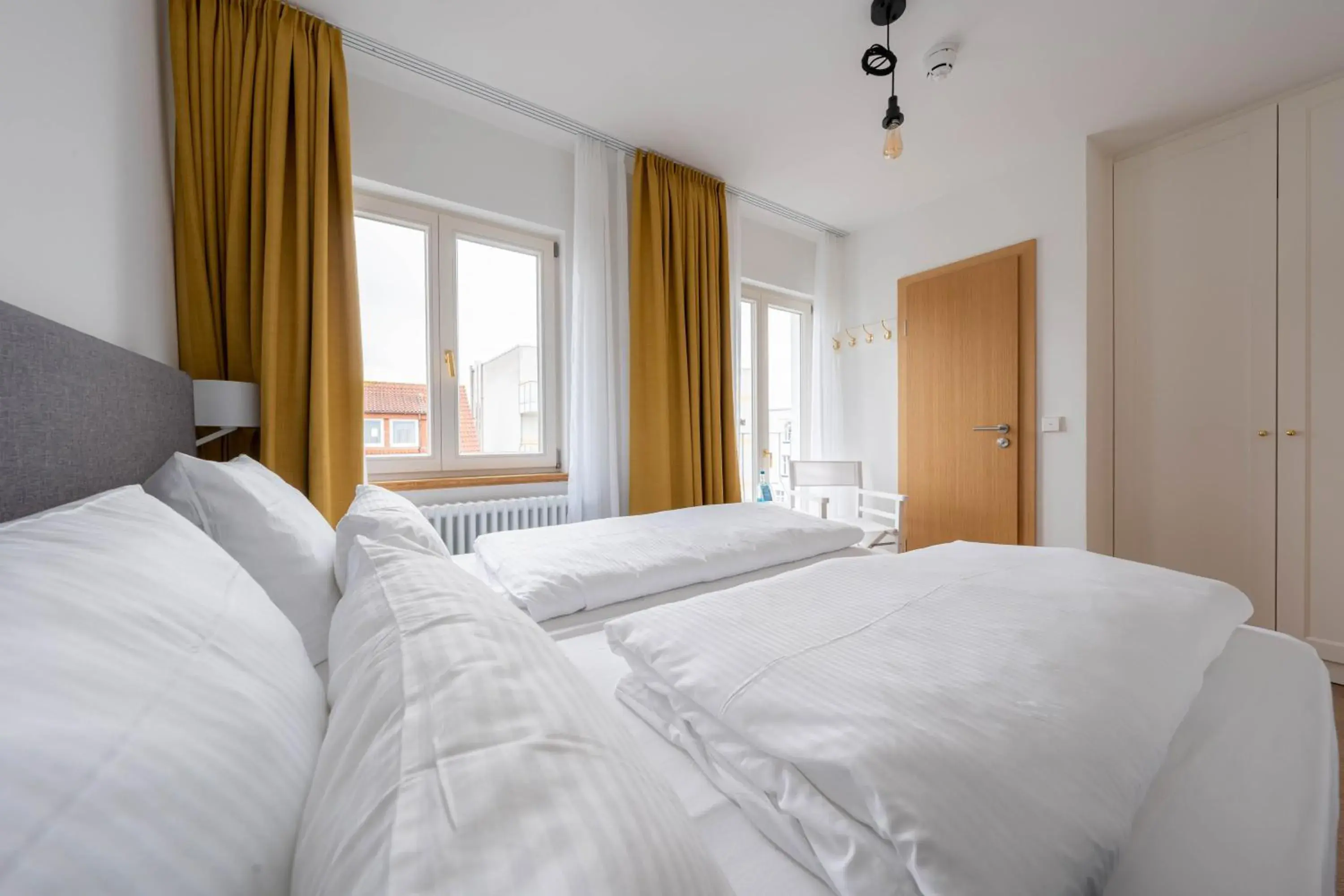 Photo of the whole room, Bed in Logierhaus am Rathaus