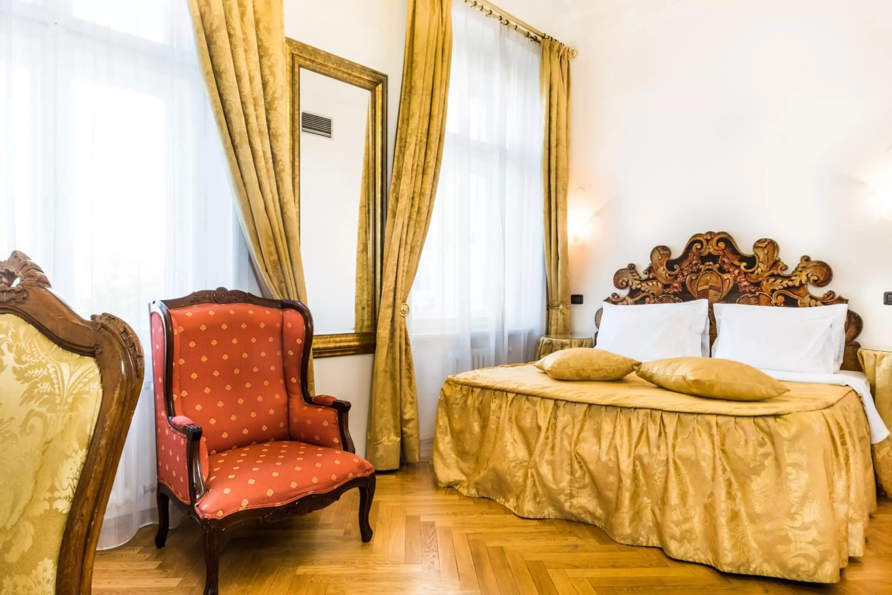 Seating area, Bed in Charles Bridge Palace