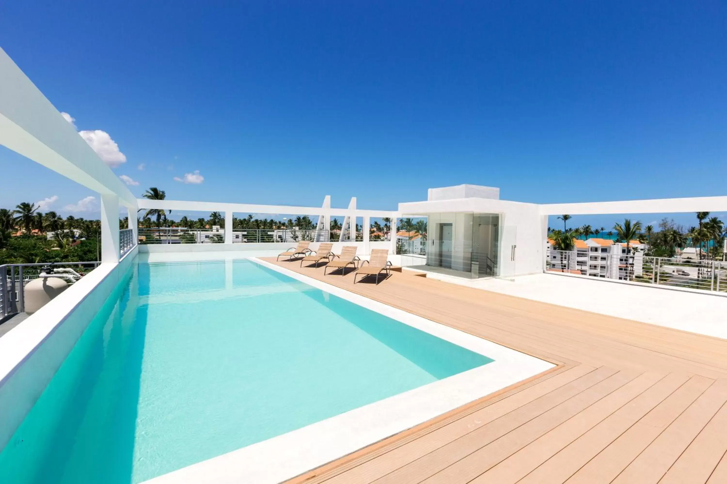 Swimming Pool in DUCASSI SUITES ROOFTOP POOL - BEACH CLUB and SPA