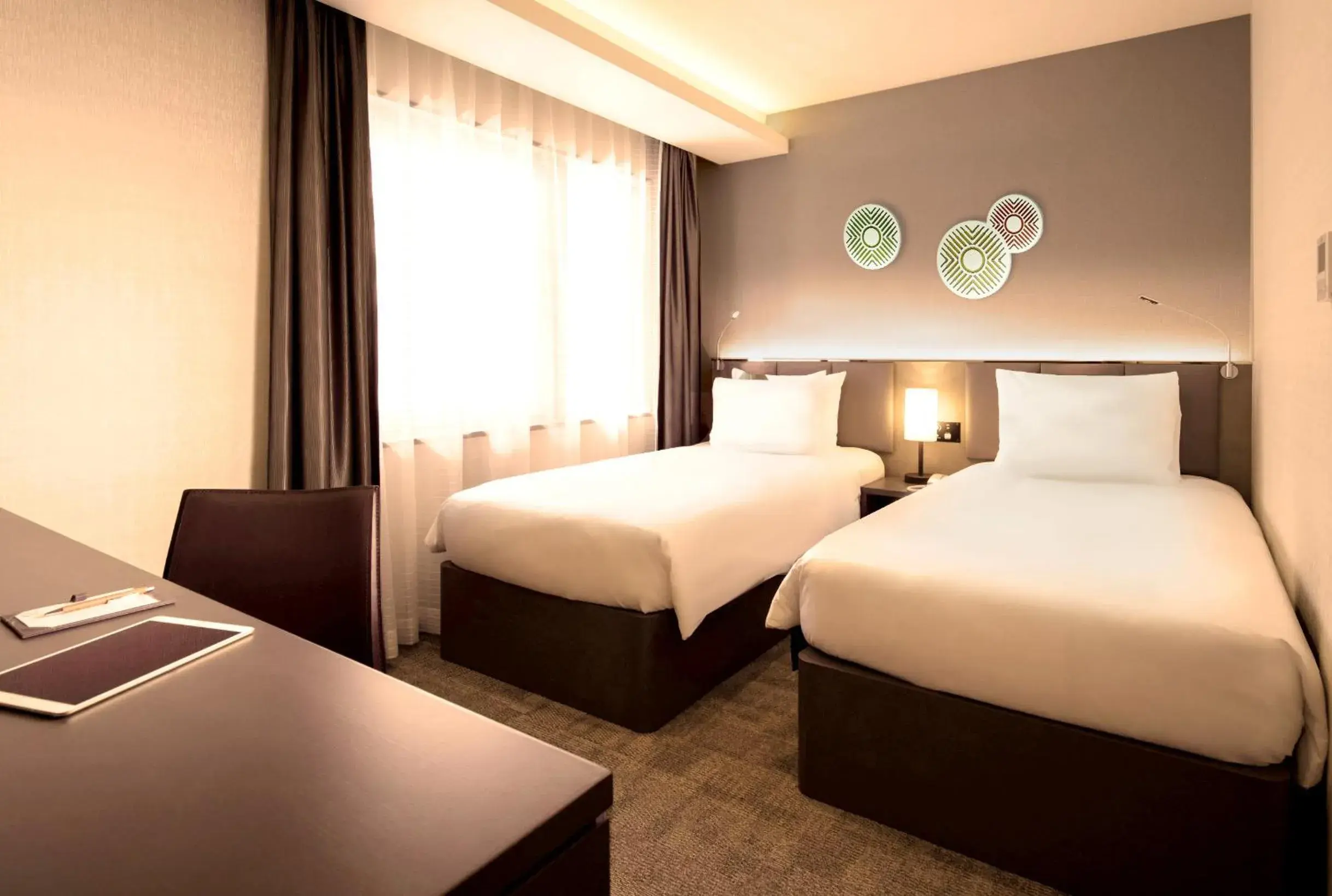 Bedroom, Bed in Holiday Inn & Suites Shin Osaka, an IHG Hotel