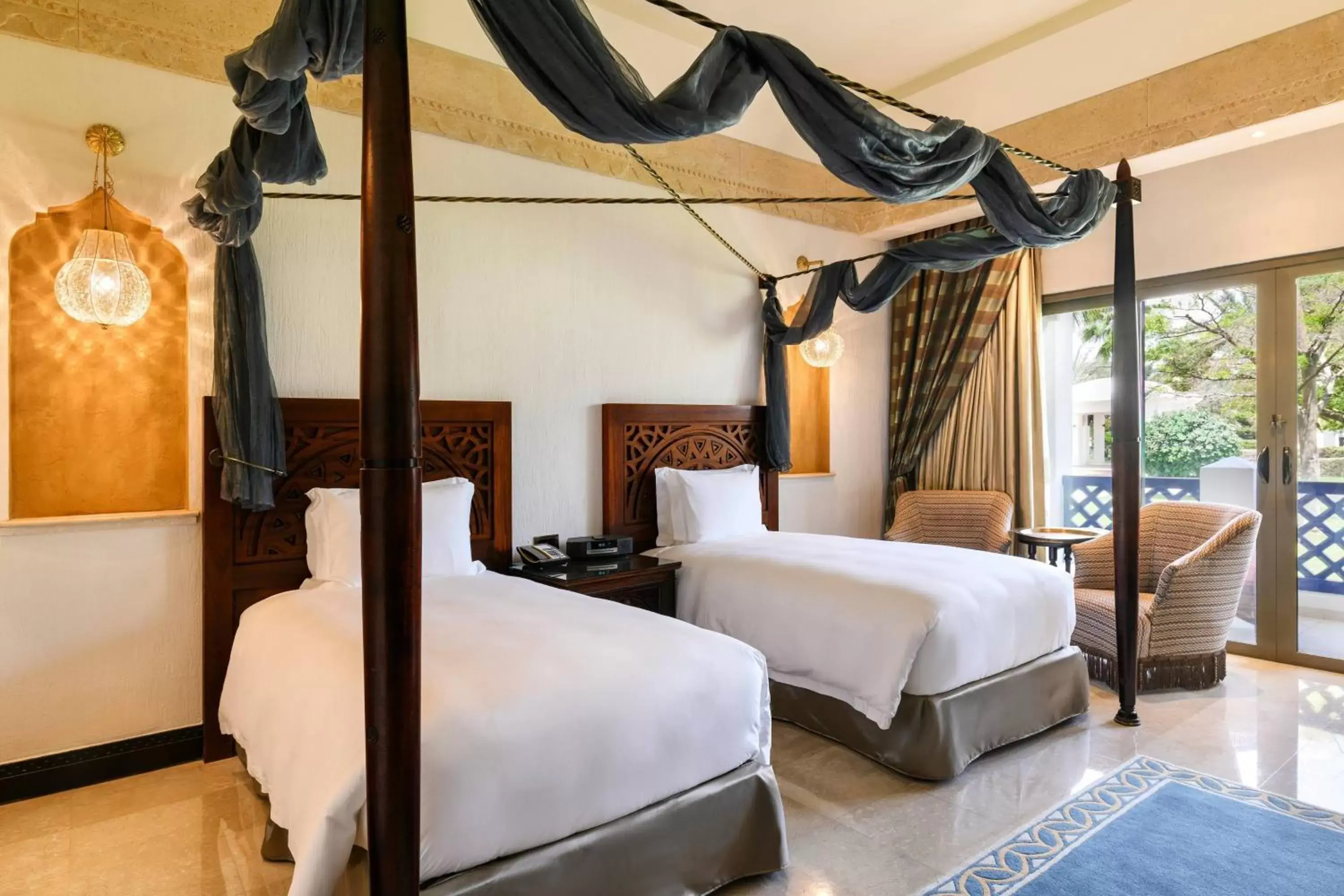 Photo of the whole room, Bed in Sharq Village & Spa, a Ritz-Carlton Hotel